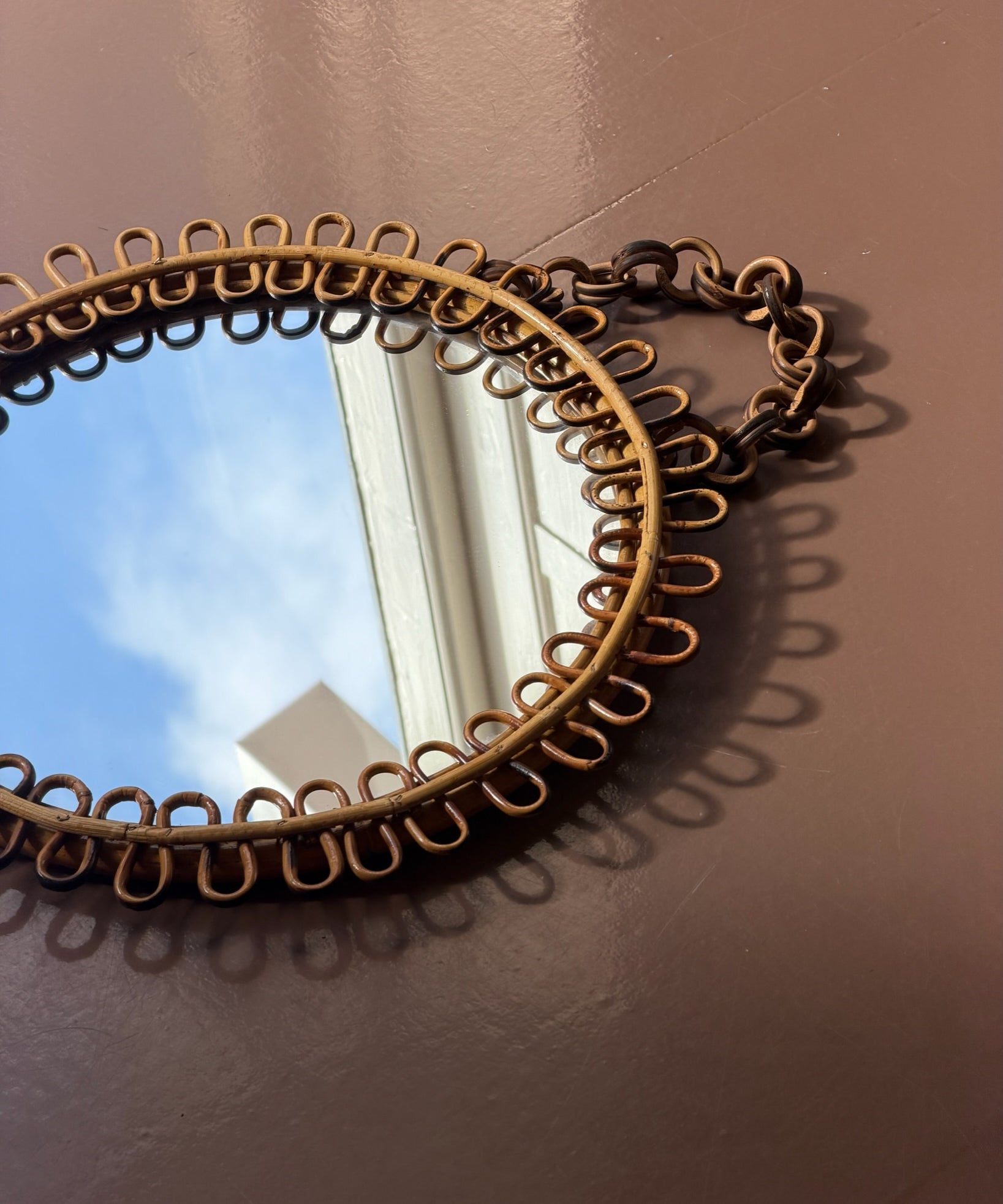 Vintage Italian round mirror with rattan frame