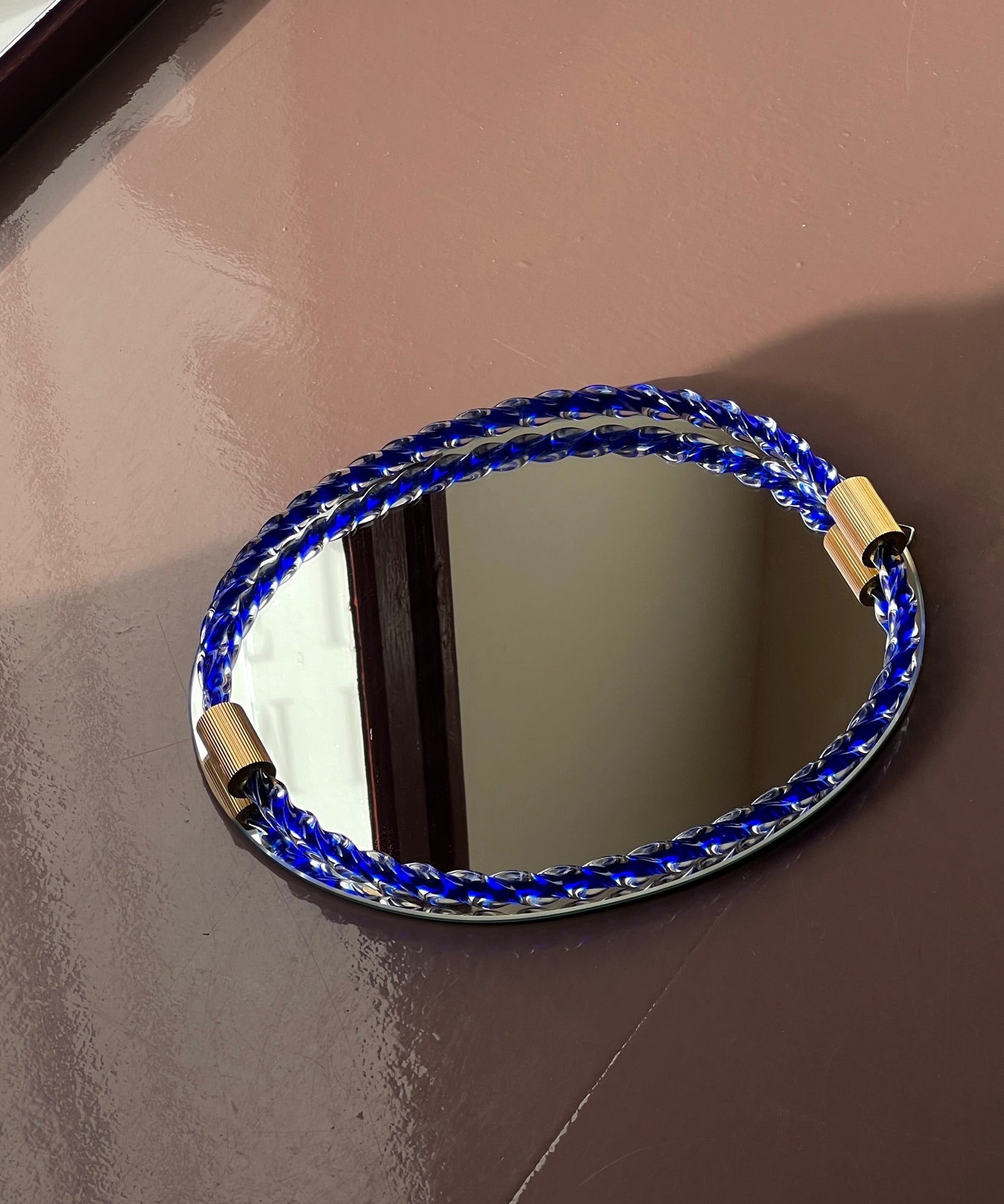 Vintage Italian mirror with twisted clear/blue glass frame