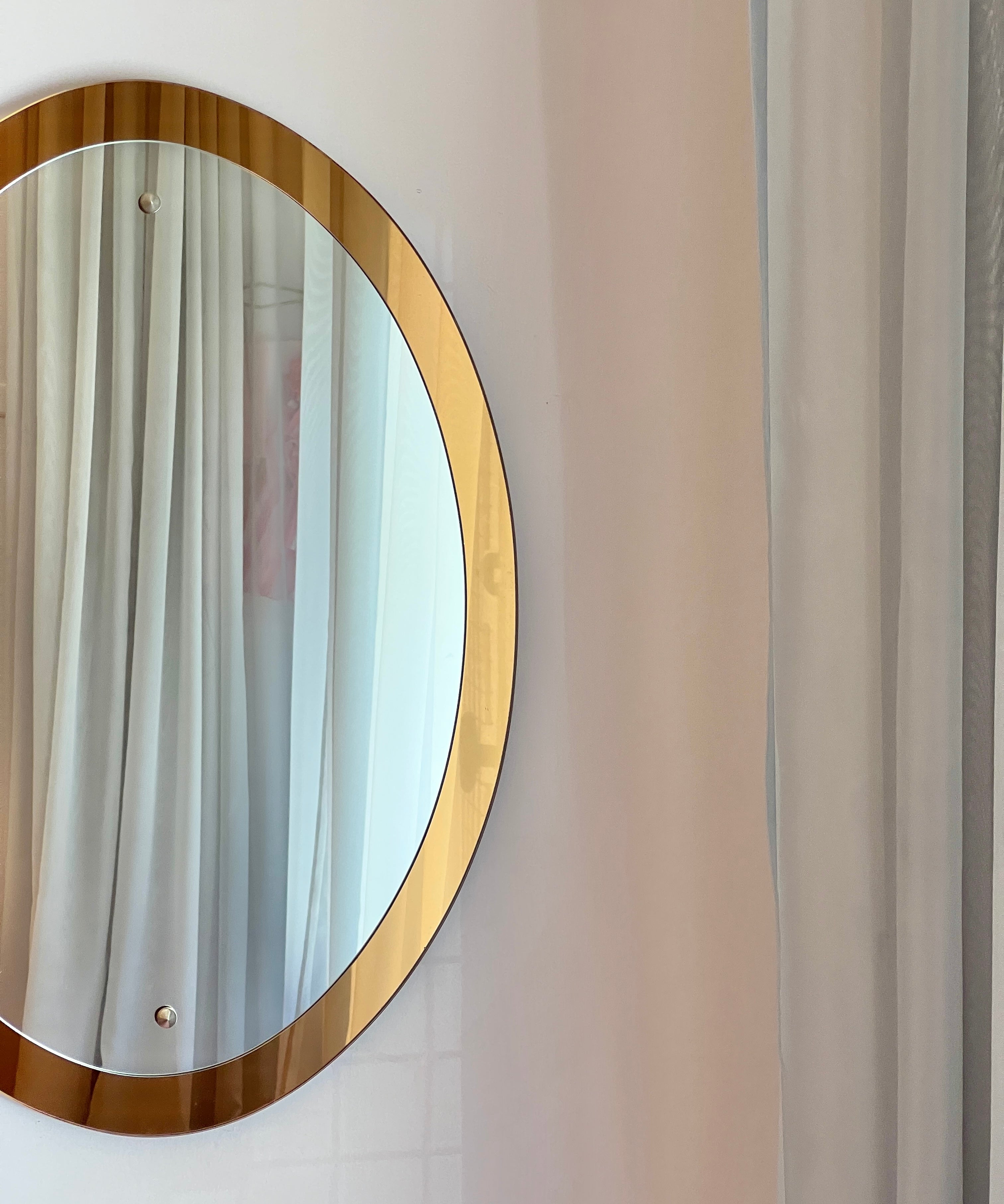 Vintage oval golden Italian mirror