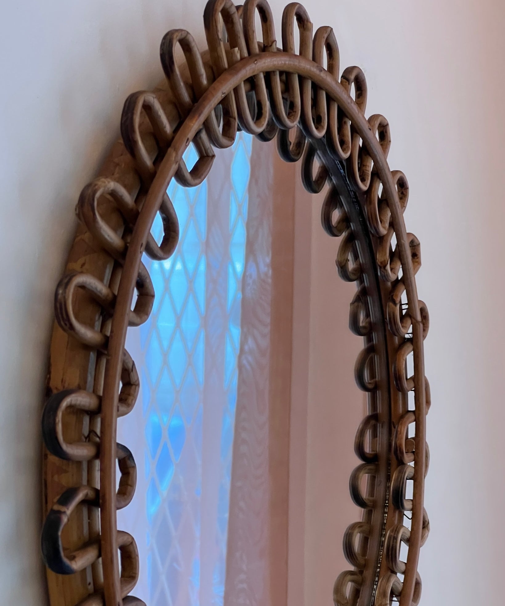 Vintage Italian mirror with round rattan frame