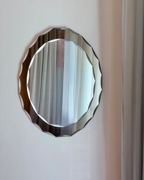 Vintage Italian mirror with golden brown faceted mirror frame