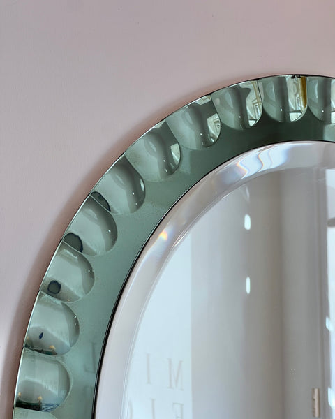Vintage Italian mirror with green faceted mirror frame