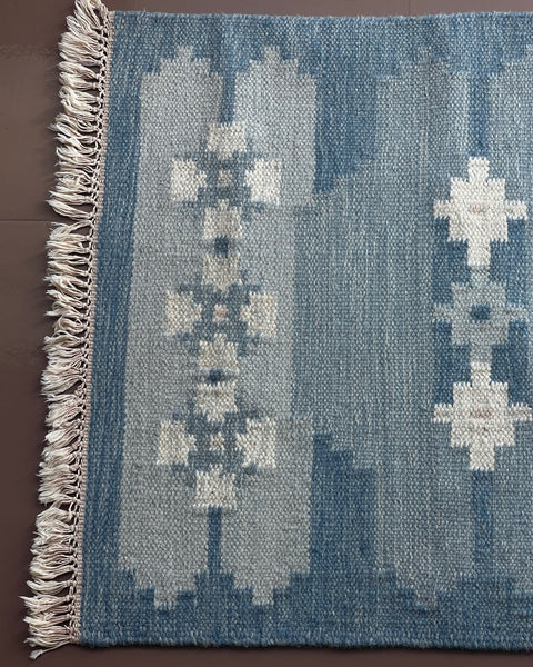 Vintage blue flat weave rug