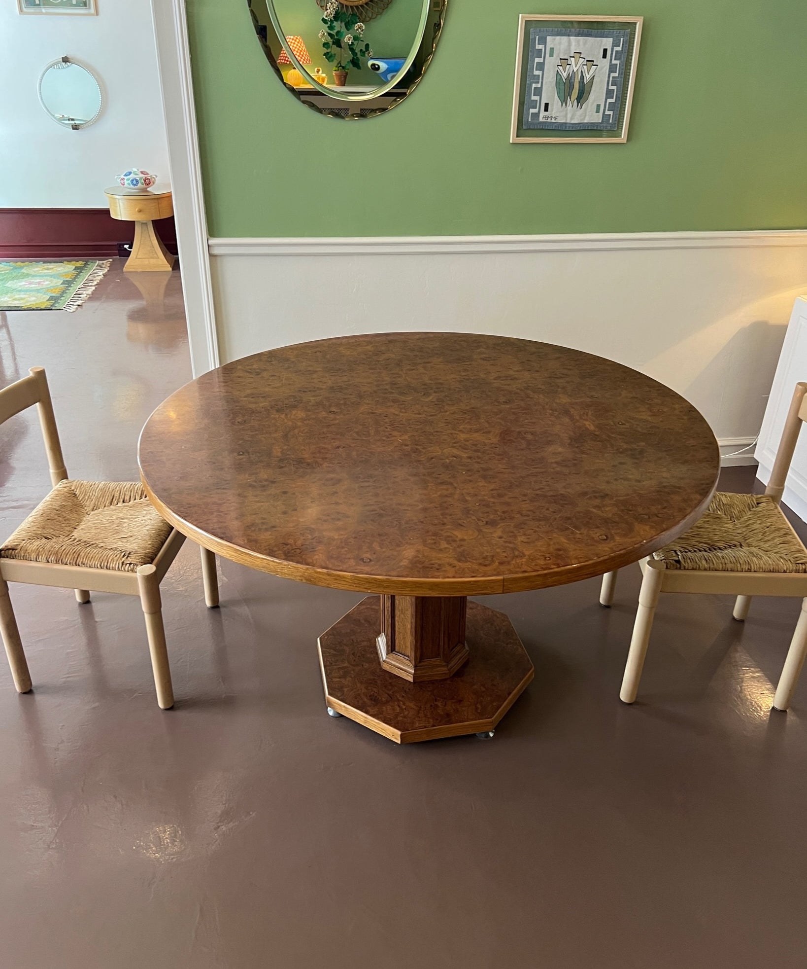 Vintage round wooden dining table with burl details