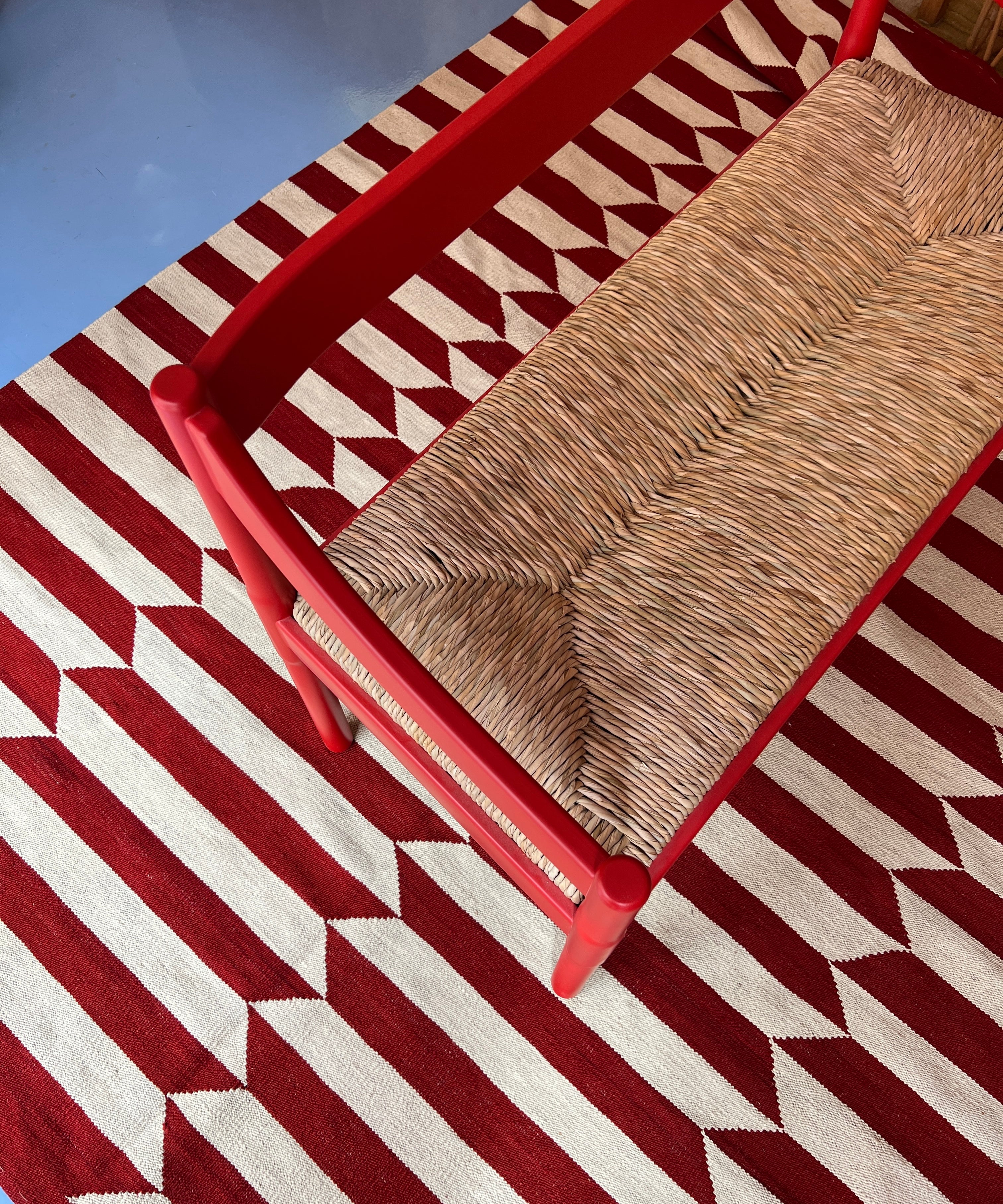Carimate red bench by Vico Magistretti