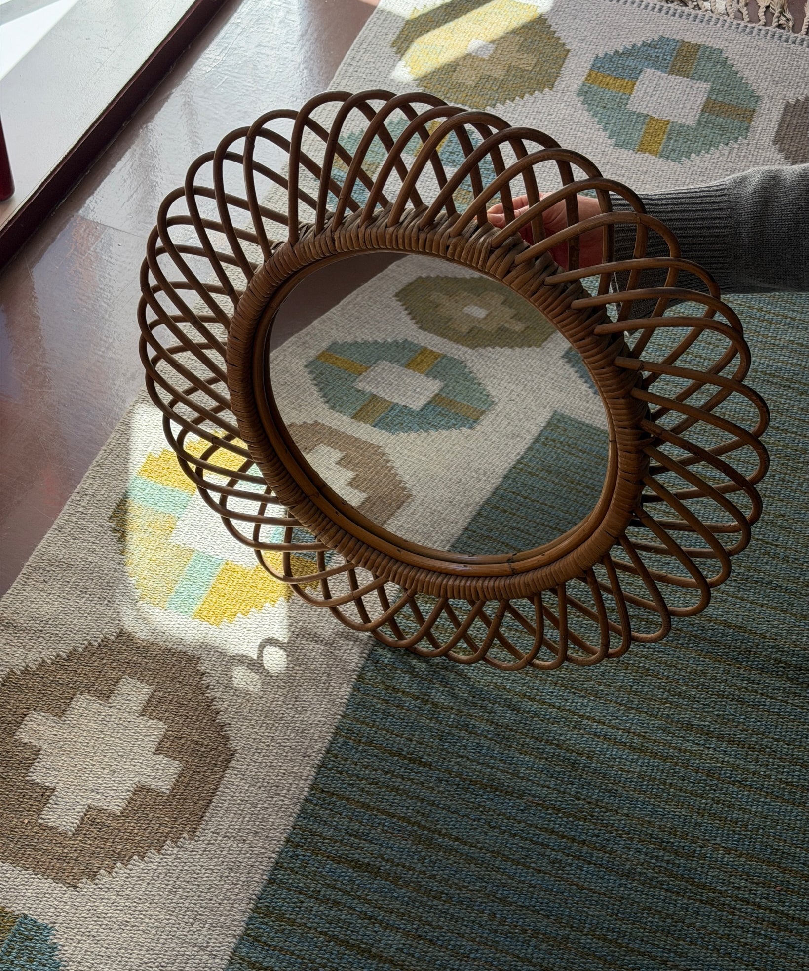 Vintage Italian round mirror with rattan frame