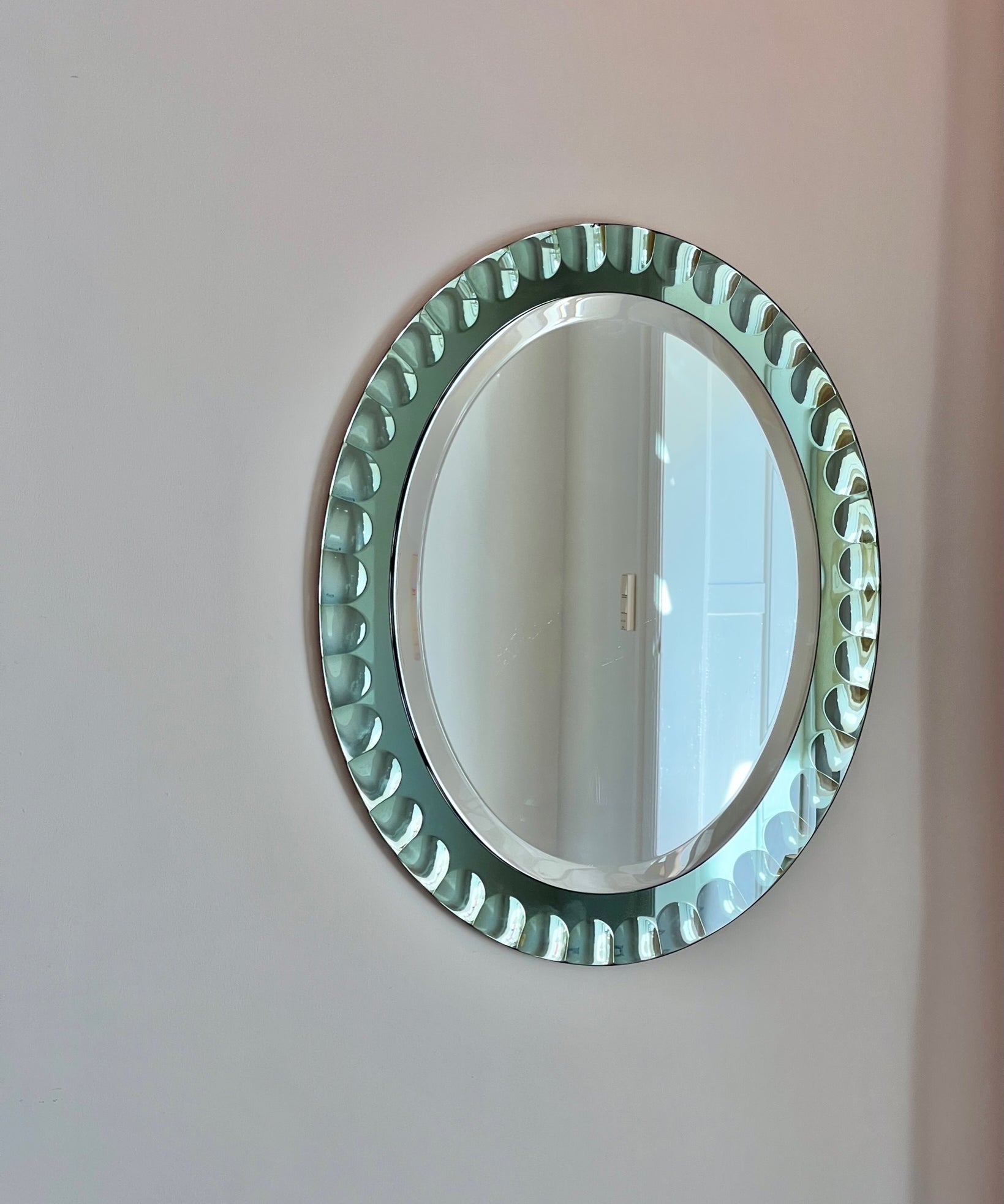 Vintage Italian mirror with green faceted mirror frame