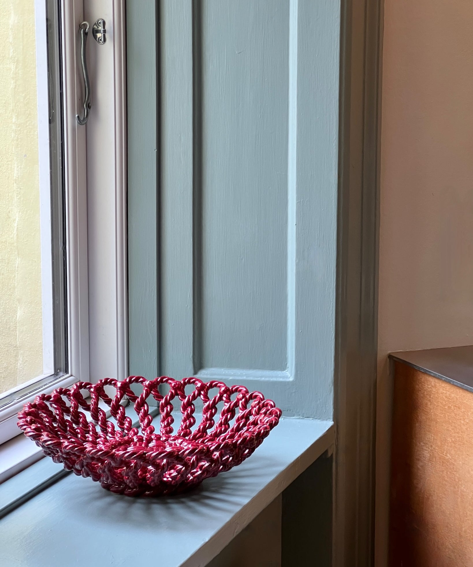 Vintage red ceramic basket