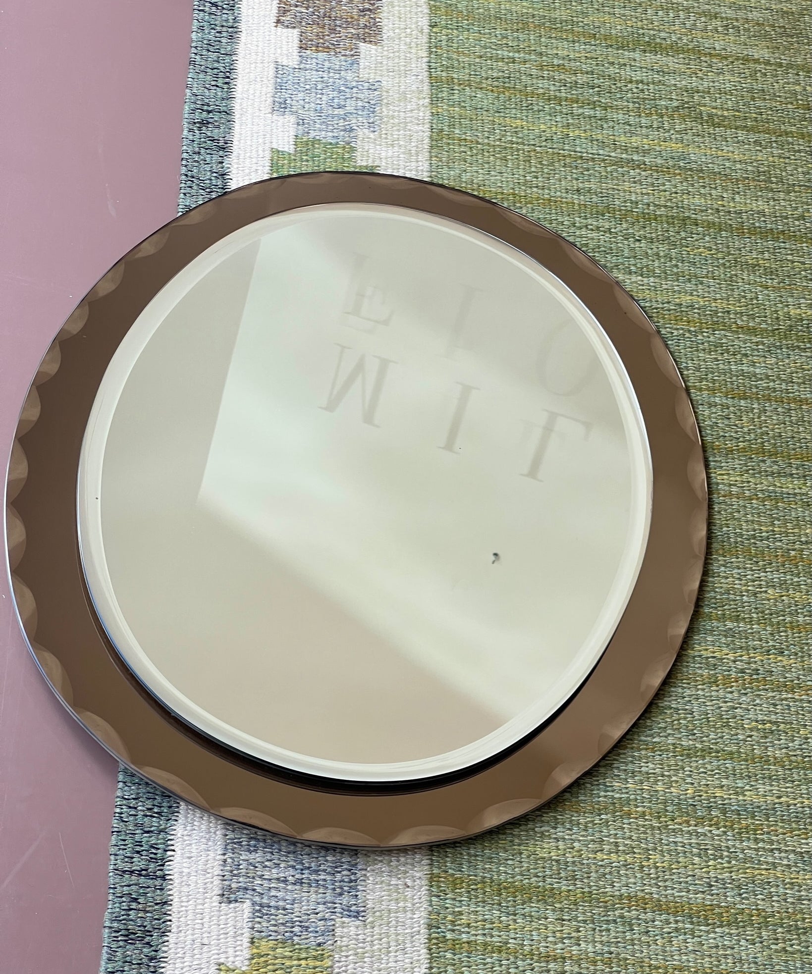 Vintage Italian mirror with golden brown faceted mirror frame