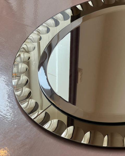 Vintage Italian mirror with golden brown faceted mirror frame