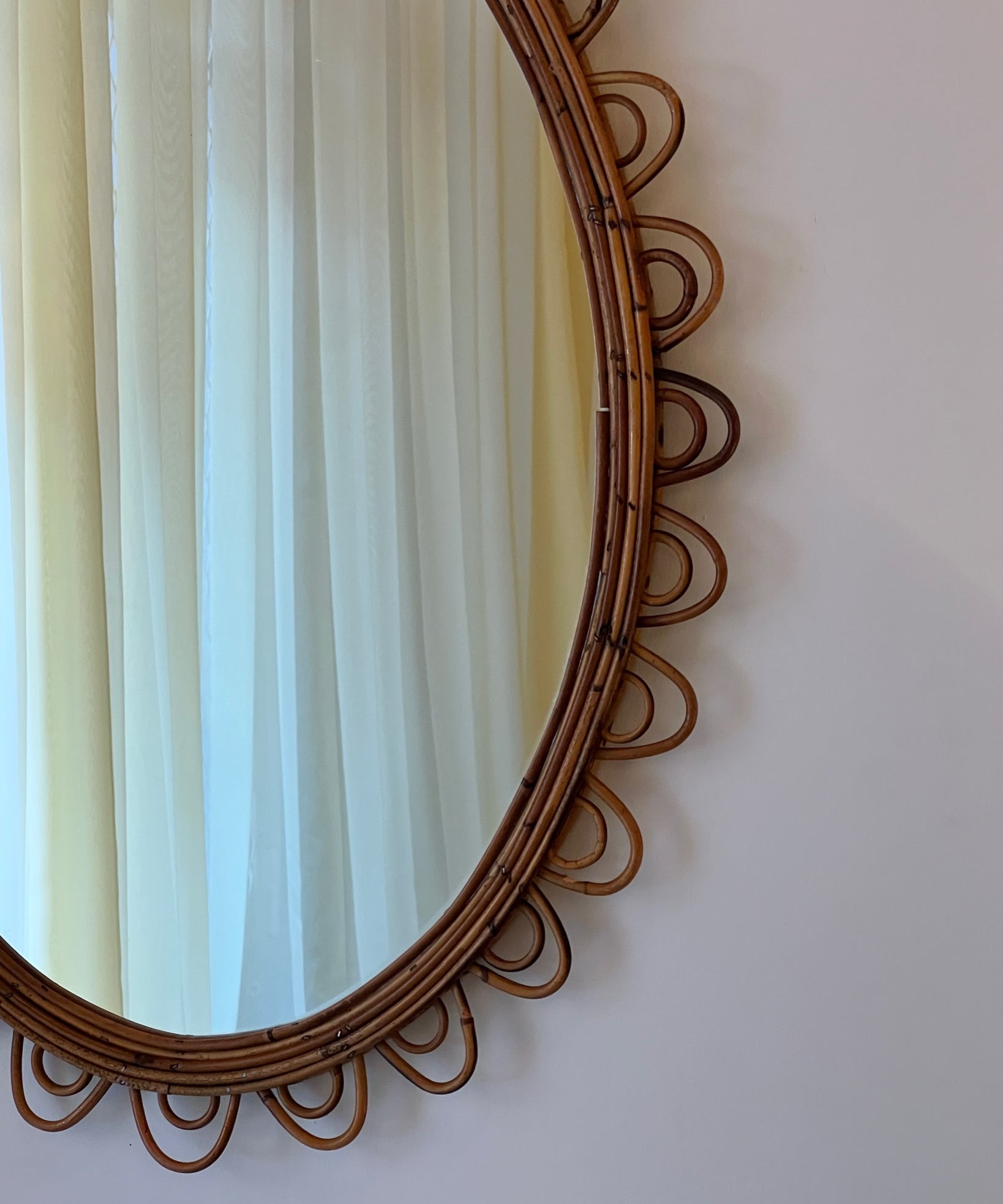 Vintage Italian mirror with rattan frame