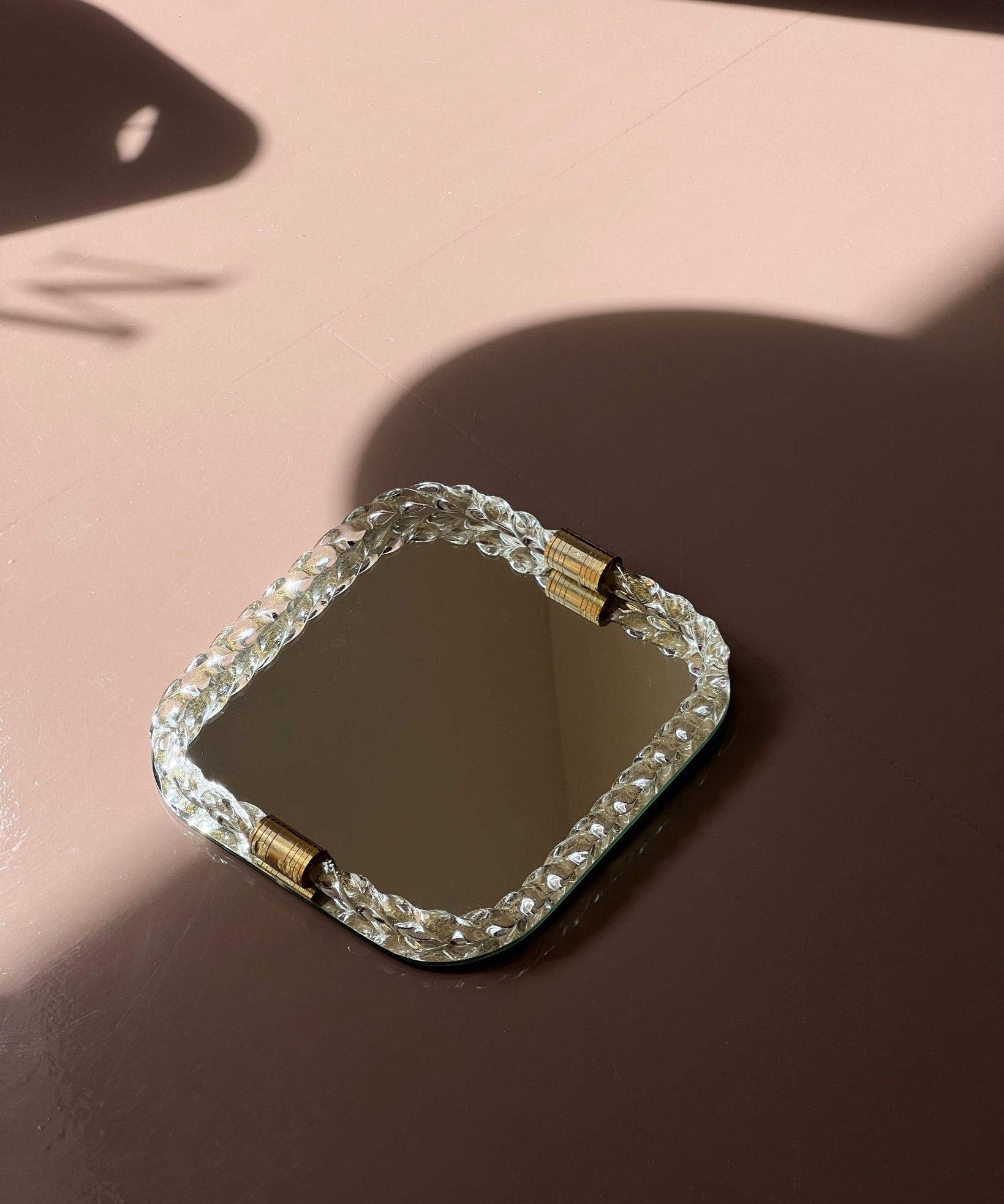 Vintage Italian mirror with twisted clear/golden glass frame