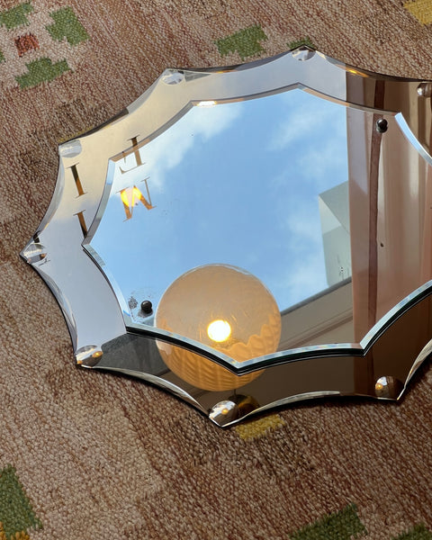 Vintage Italian mirror with golden brown faceted mirror frame