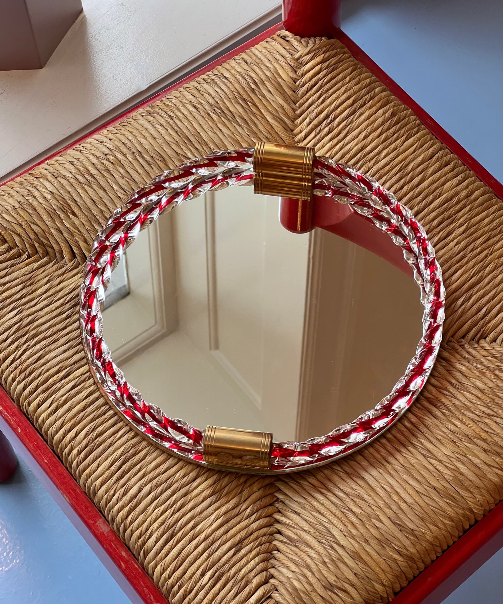 Vintage Italian mirror with twisted clear/red glass frame