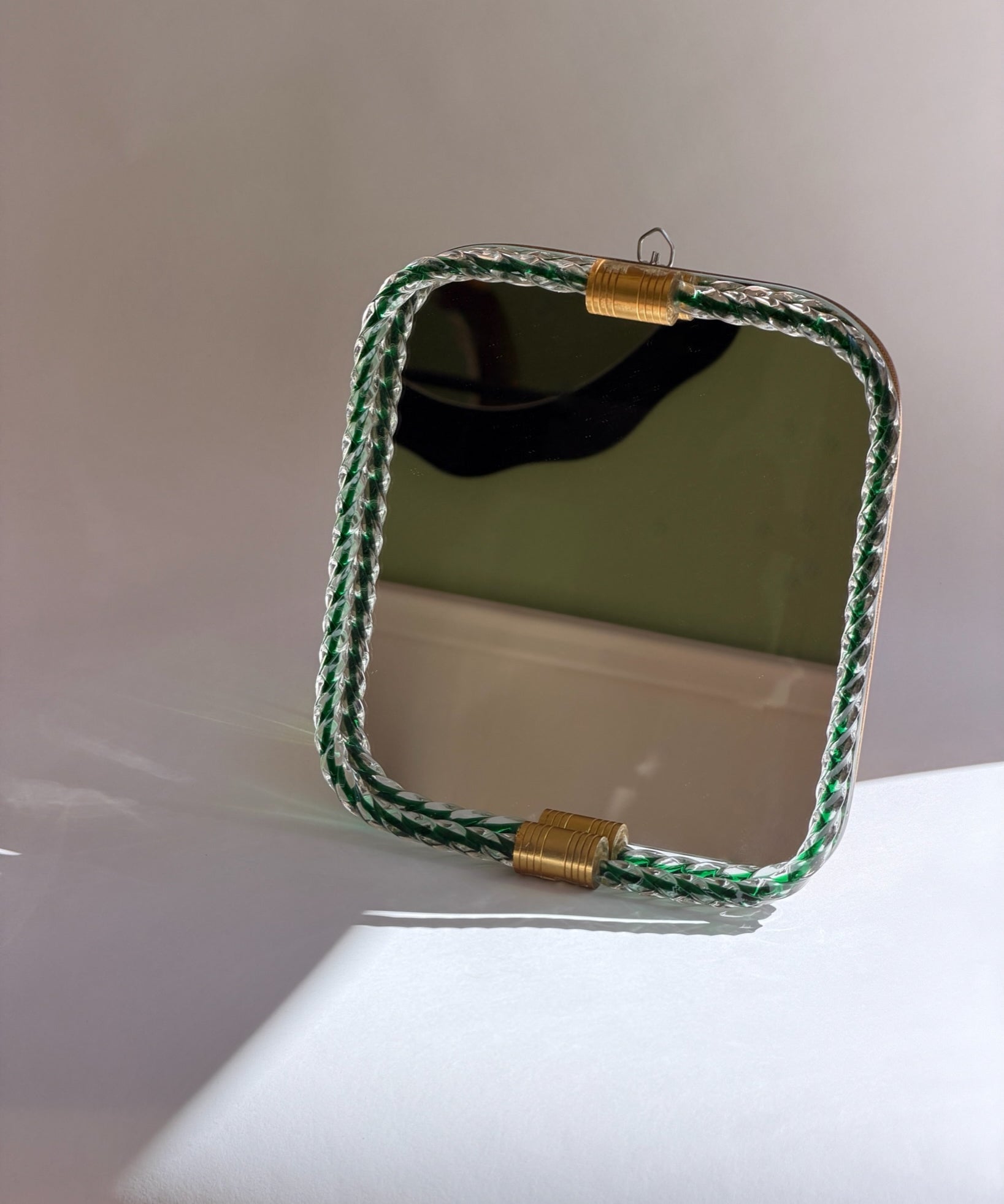 Vintage Italian mirror with twisted clear/green glass frame