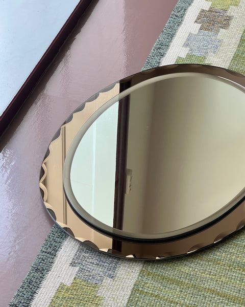 Vintage Italian mirror with golden brown faceted mirror frame