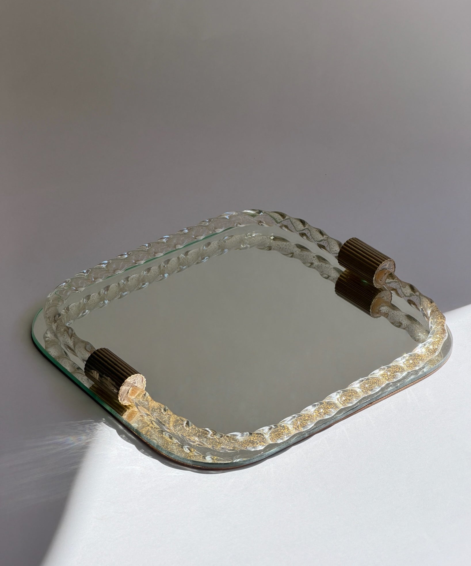 Vintage Italian mirror with twisted clear/golden glass frame