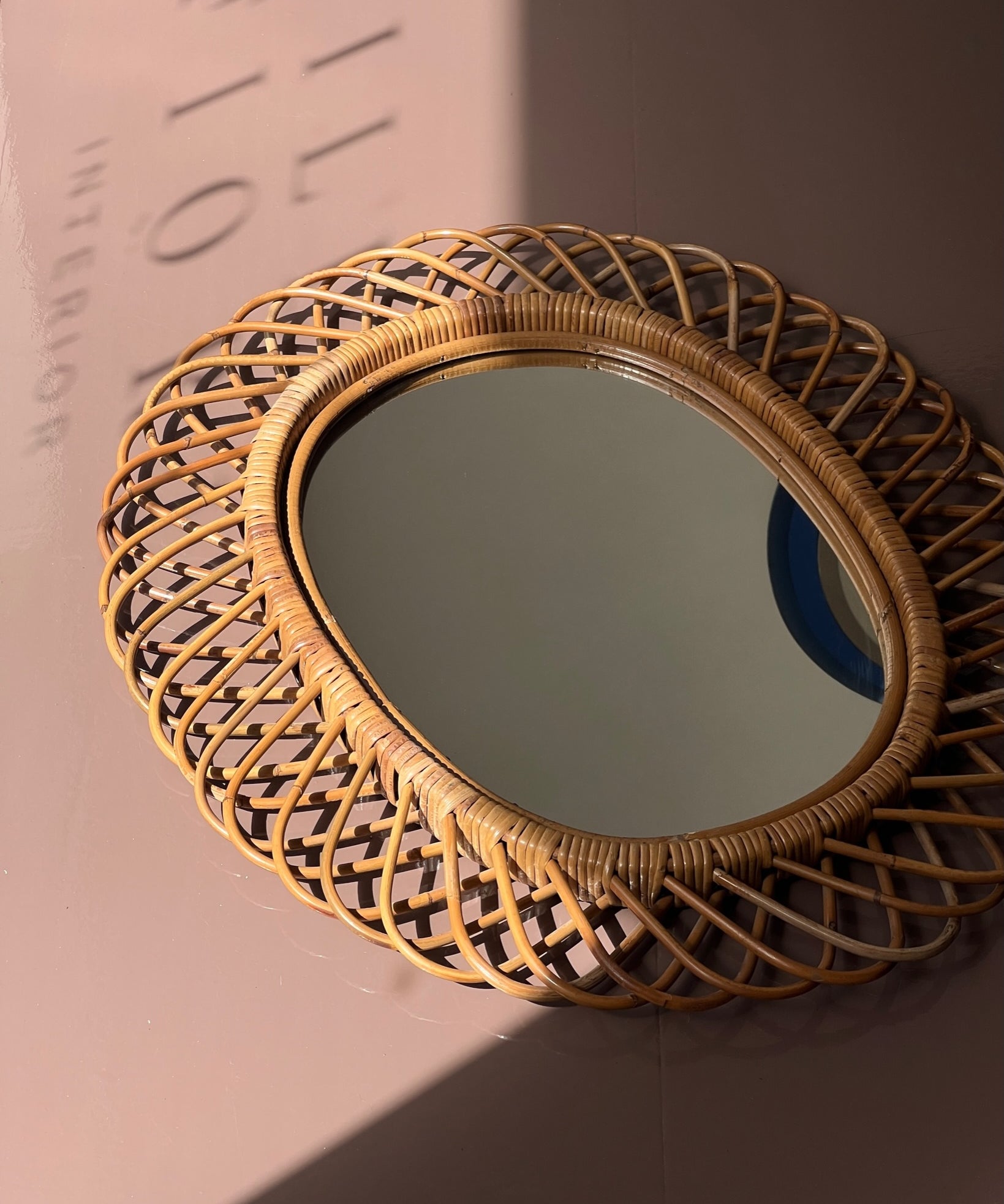 Vintage Italian mirror with rattan frame