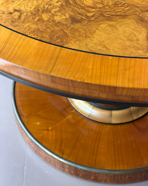 Vintage round wooden dining table with burl details