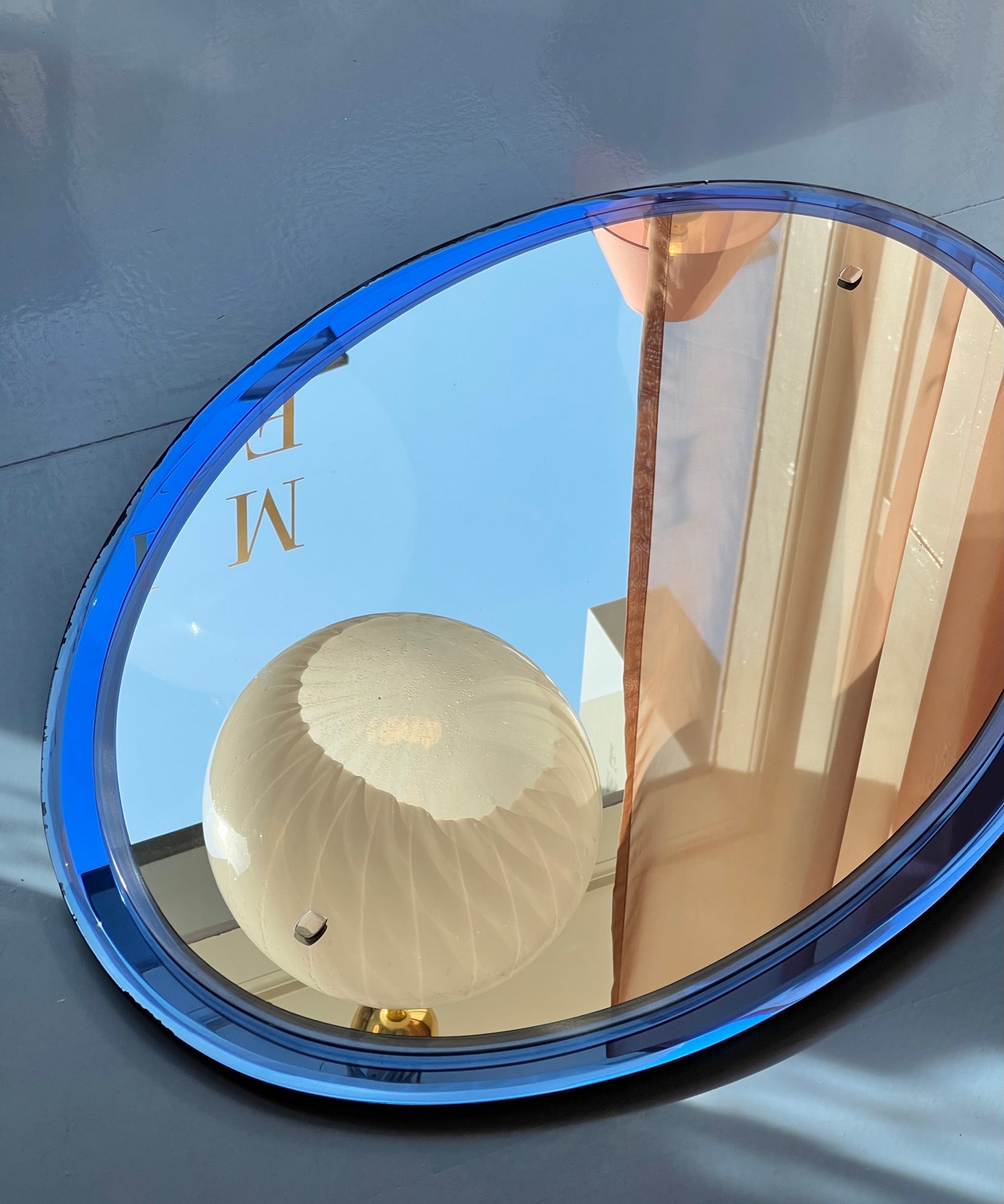 Vintage Italian mirror with blue mirror frame