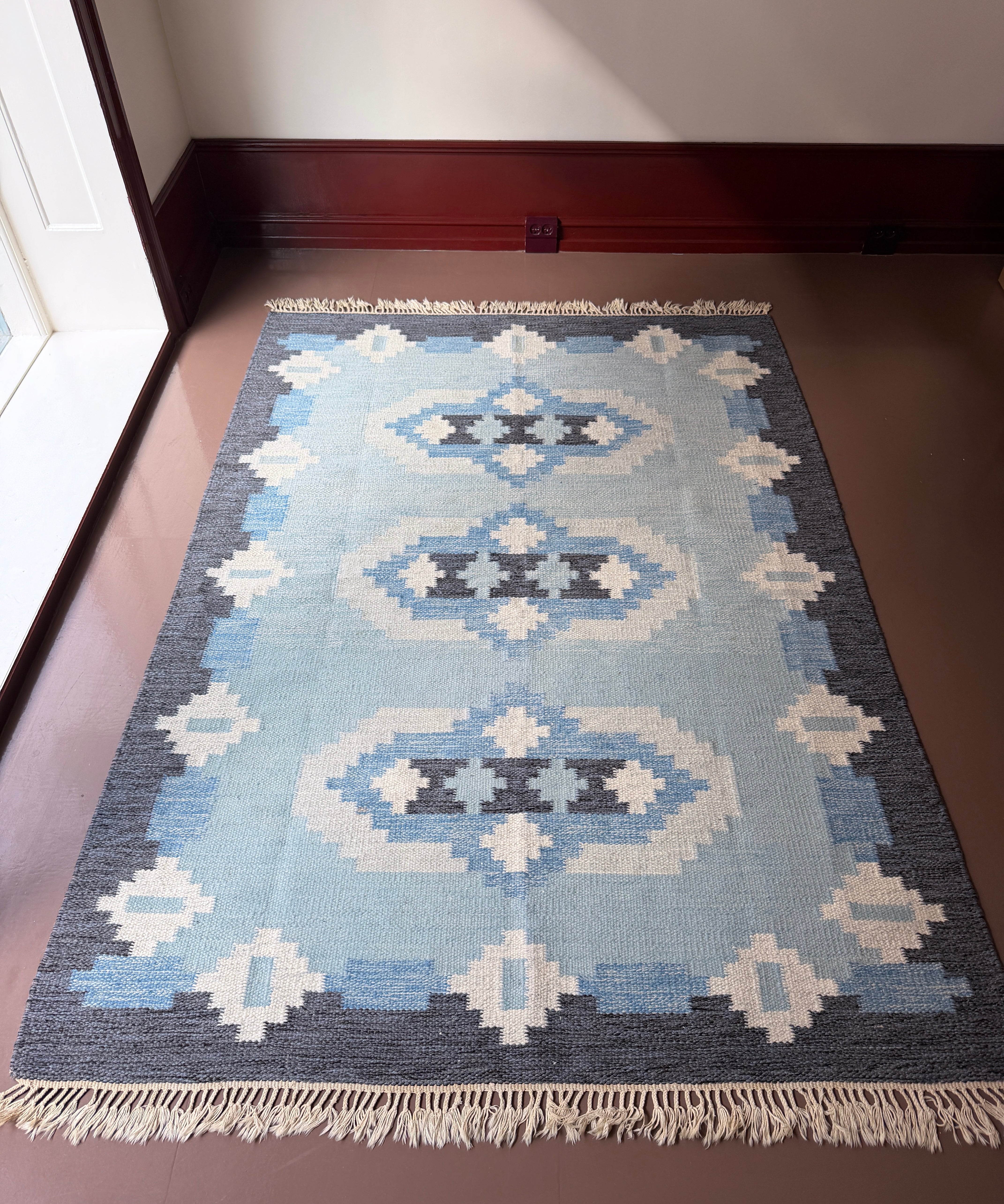 Vintage blue flat weave rug