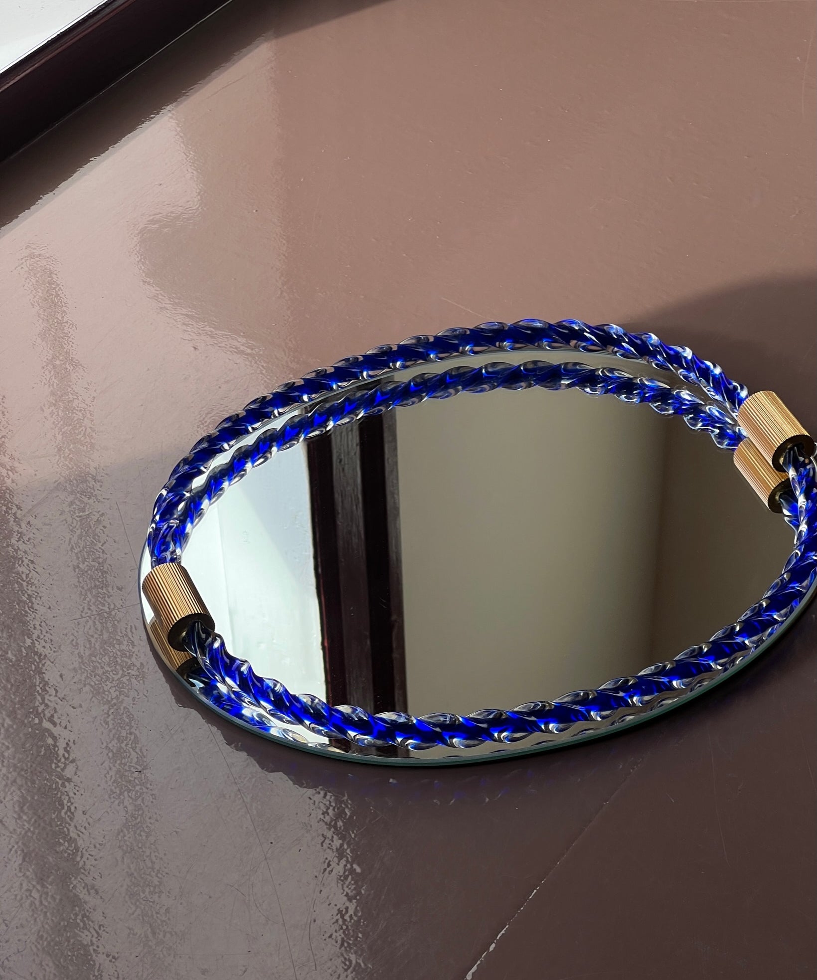 Vintage Italian mirror with twisted clear/blue glass frame