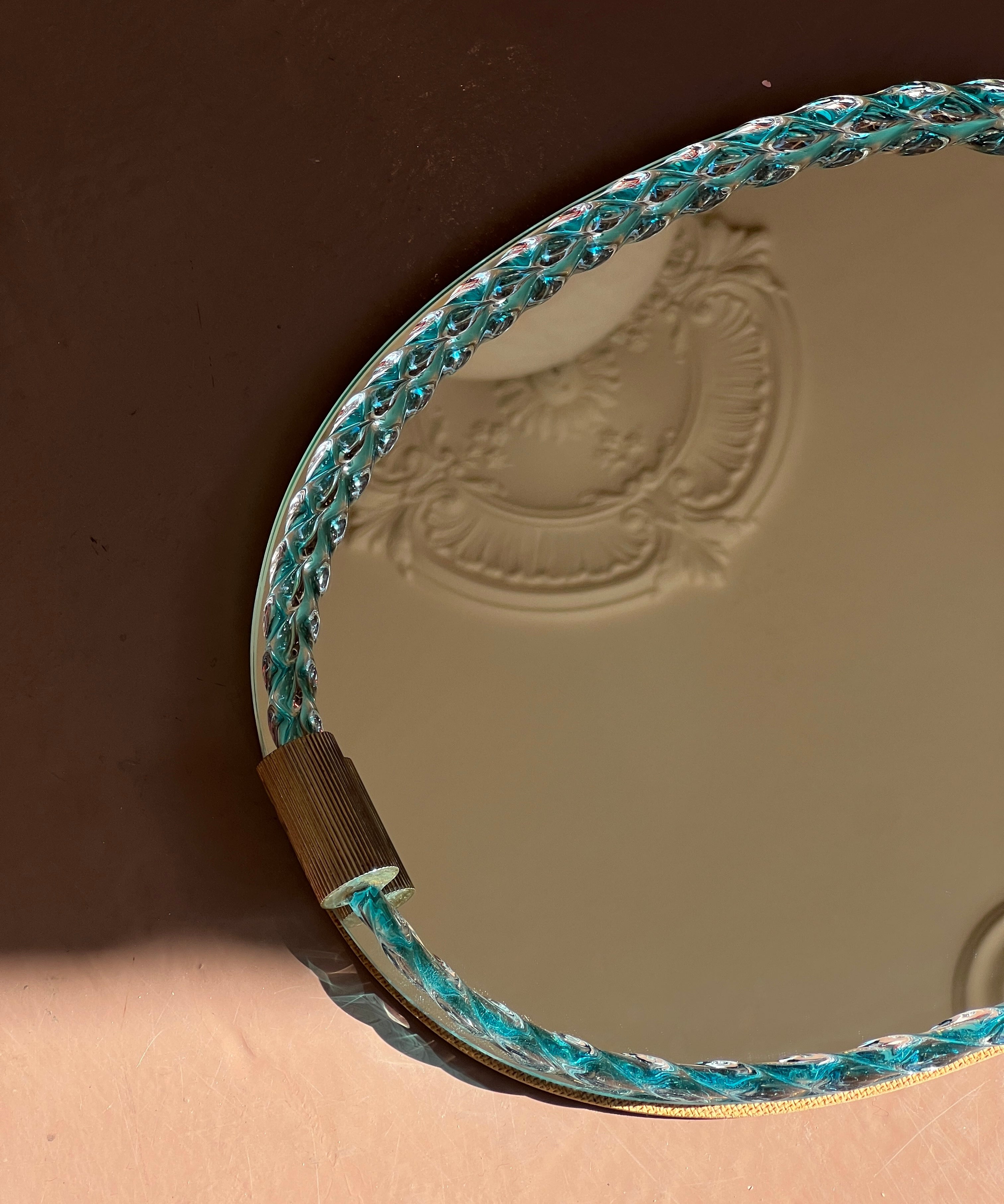 Vintage Italian mirror with twisted clear/blue glass frame