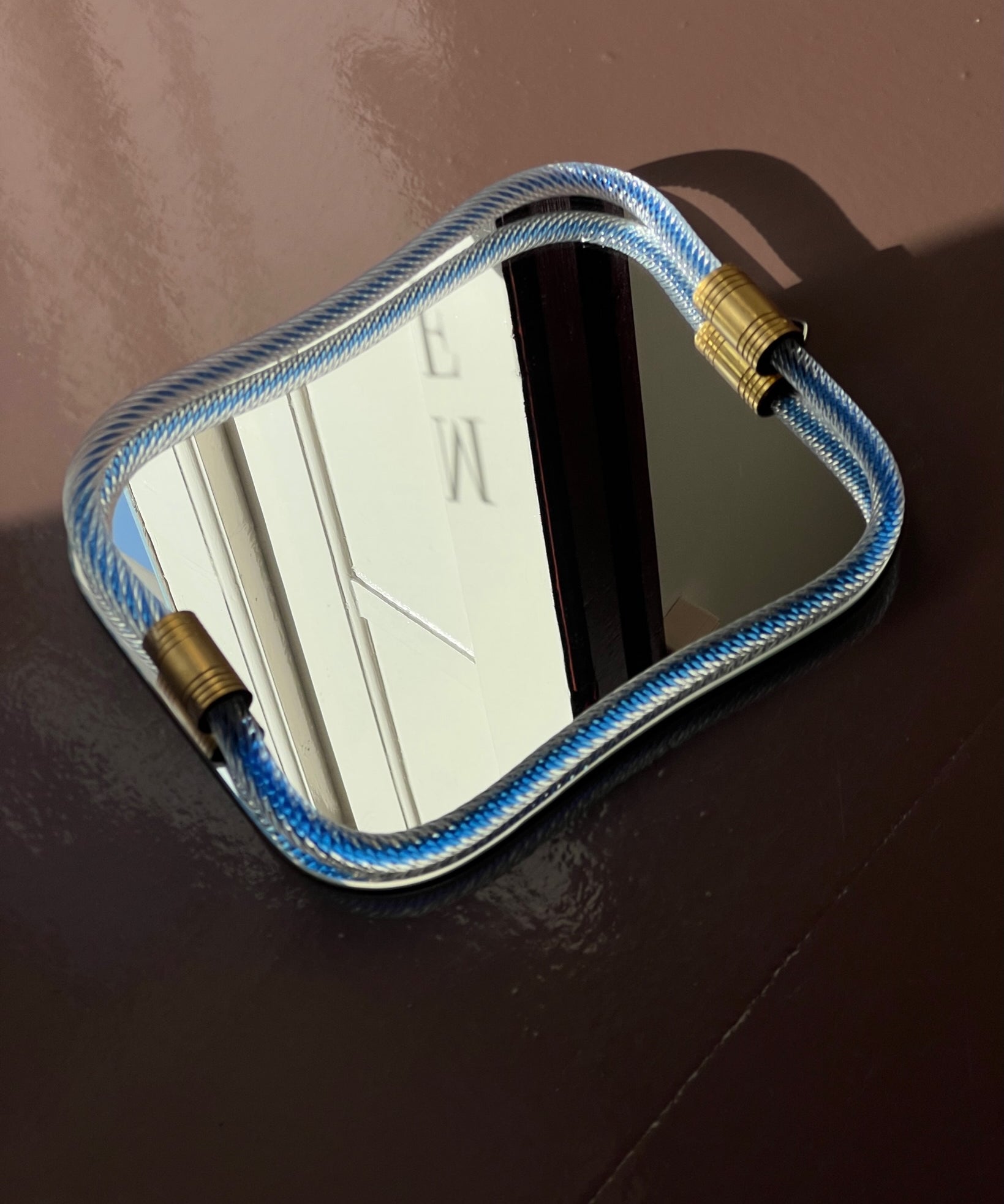 Vintage Italian mirror with twisted clear/blue glass frame