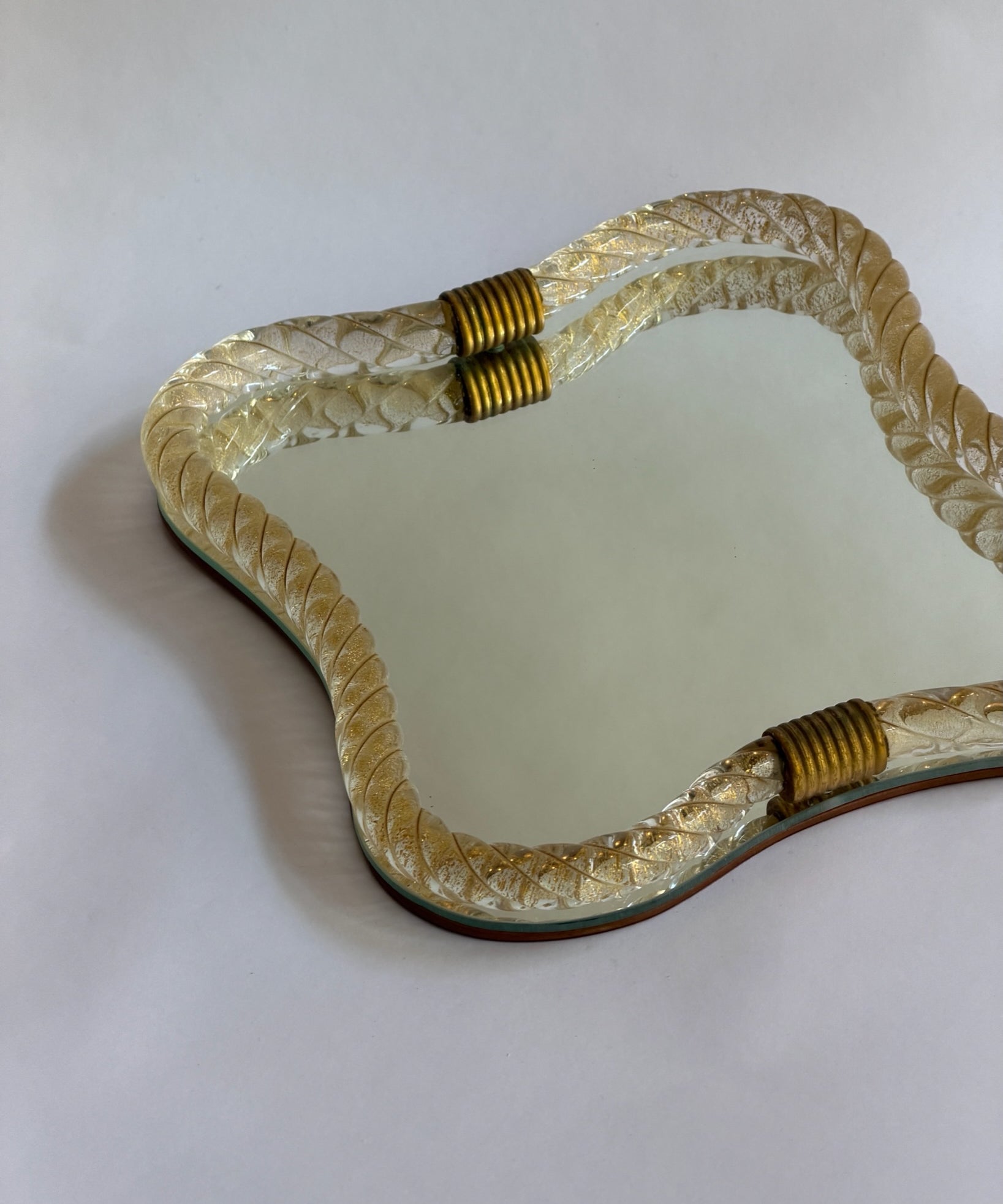 Vintage Italian mirror with twisted golden glass frame