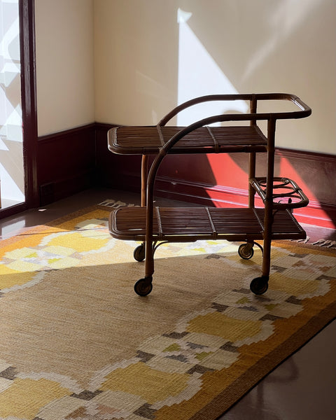 Vintage rattan trolley/table with wheels