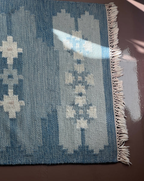 Vintage blue flat weave rug