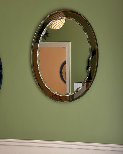 Vintage Italian mirror with golden brown faceted mirror frame