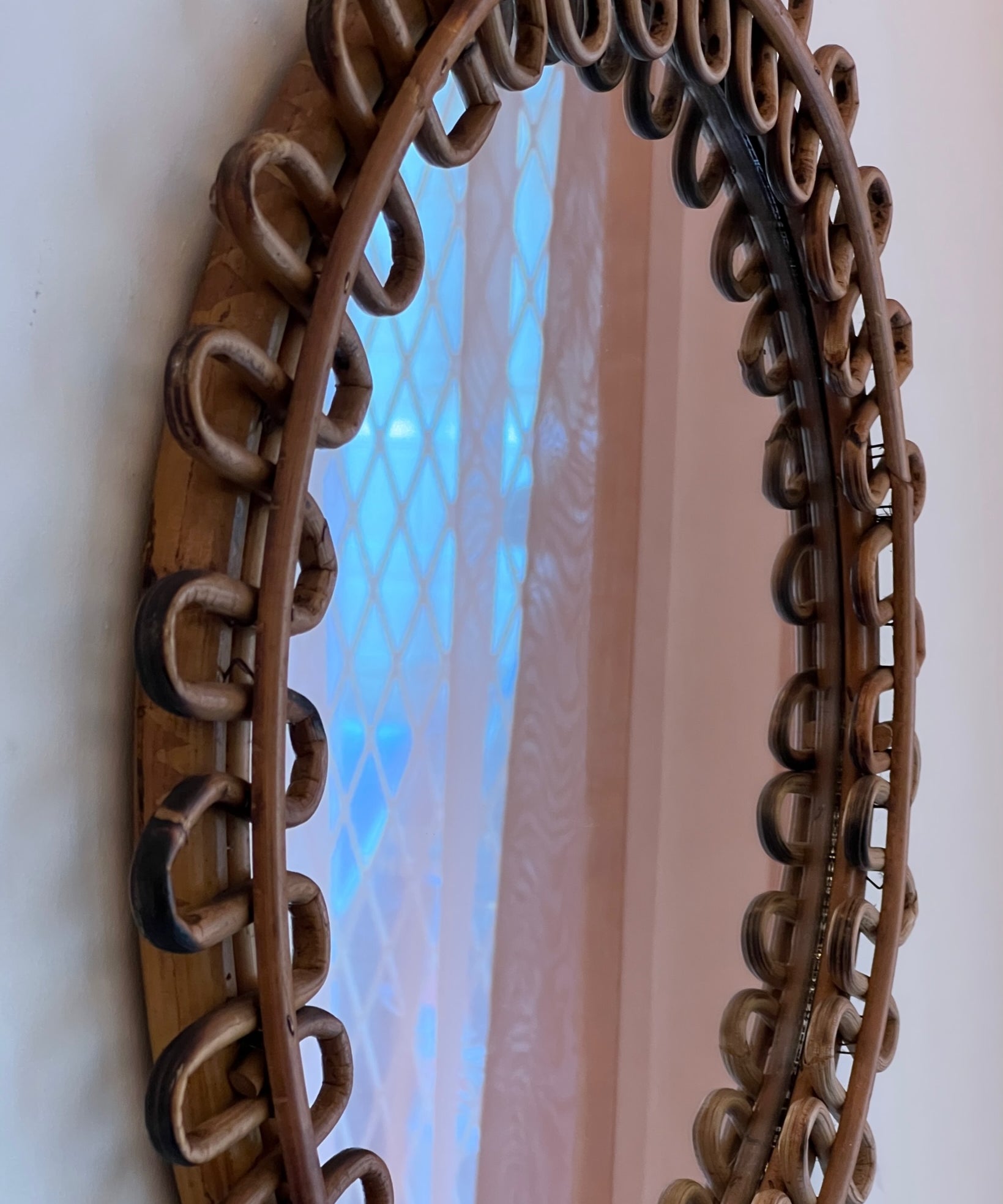 Vintage Italian mirror with round rattan frame