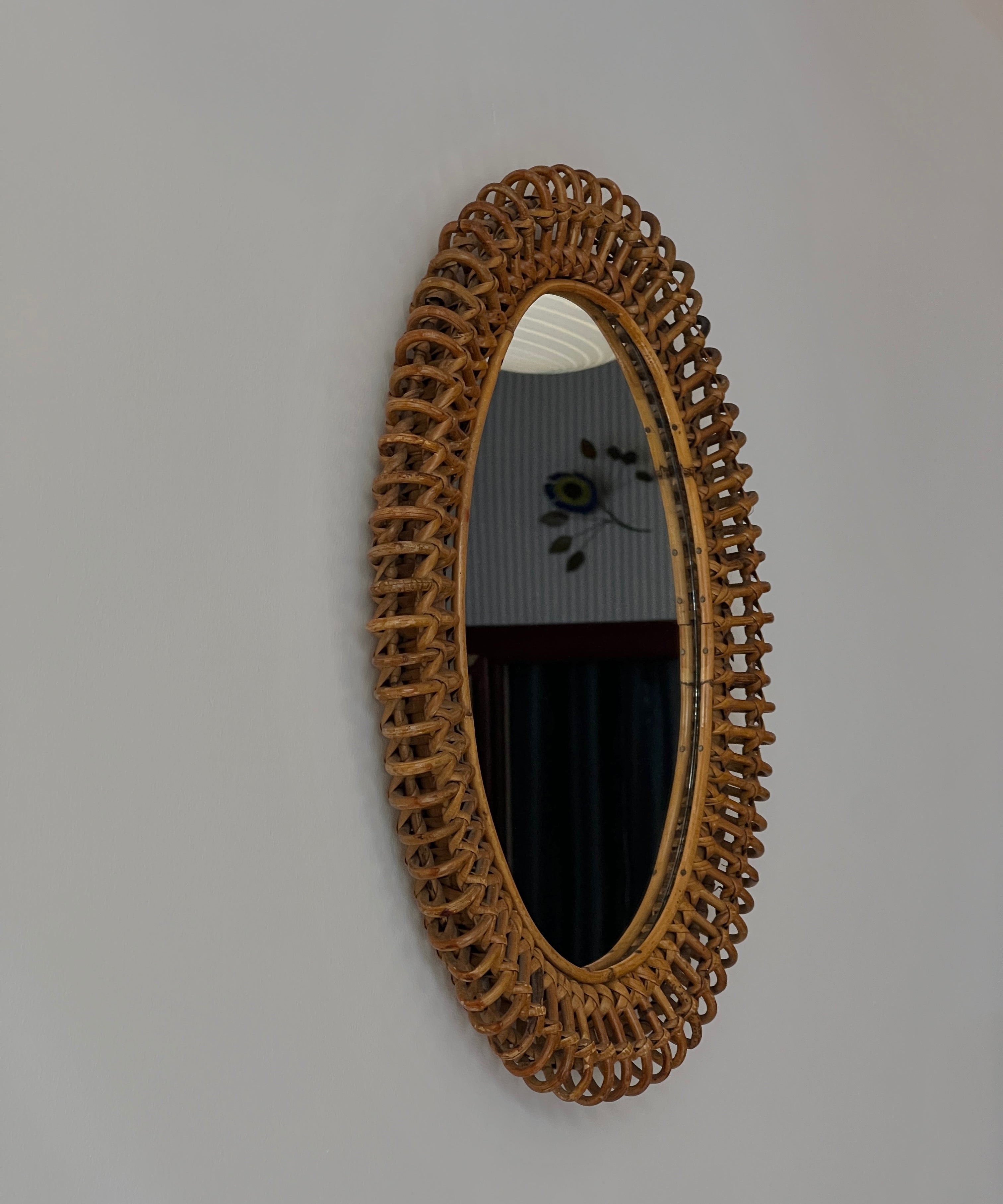 Vintage Italian mirror with rattan frame