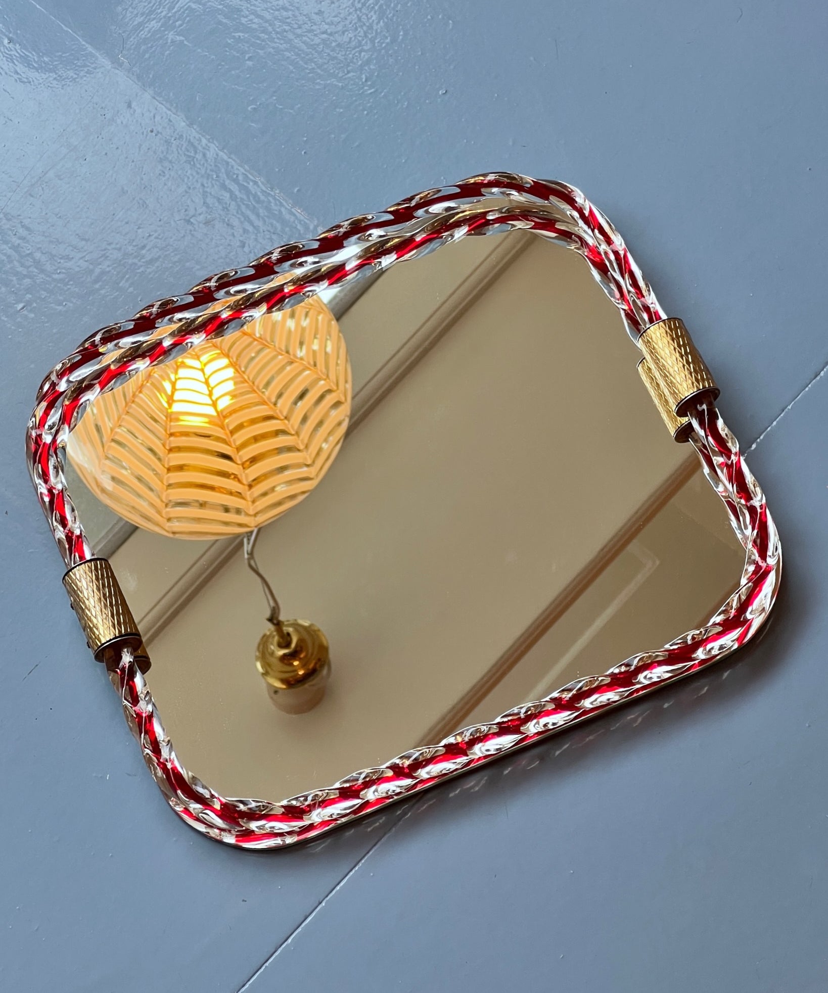 Vintage Italian mirror with twisted clear/red glass frame