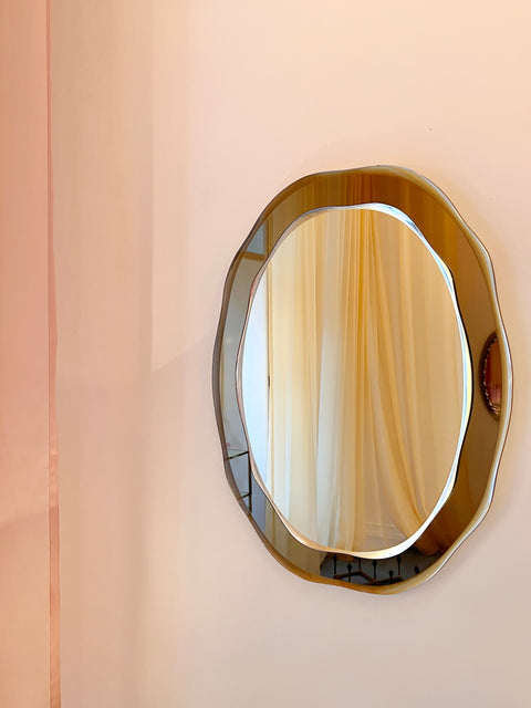 Vintage Italian mirror with wavy golden brown frame