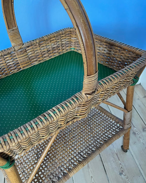 Vintage rattan table with wheels