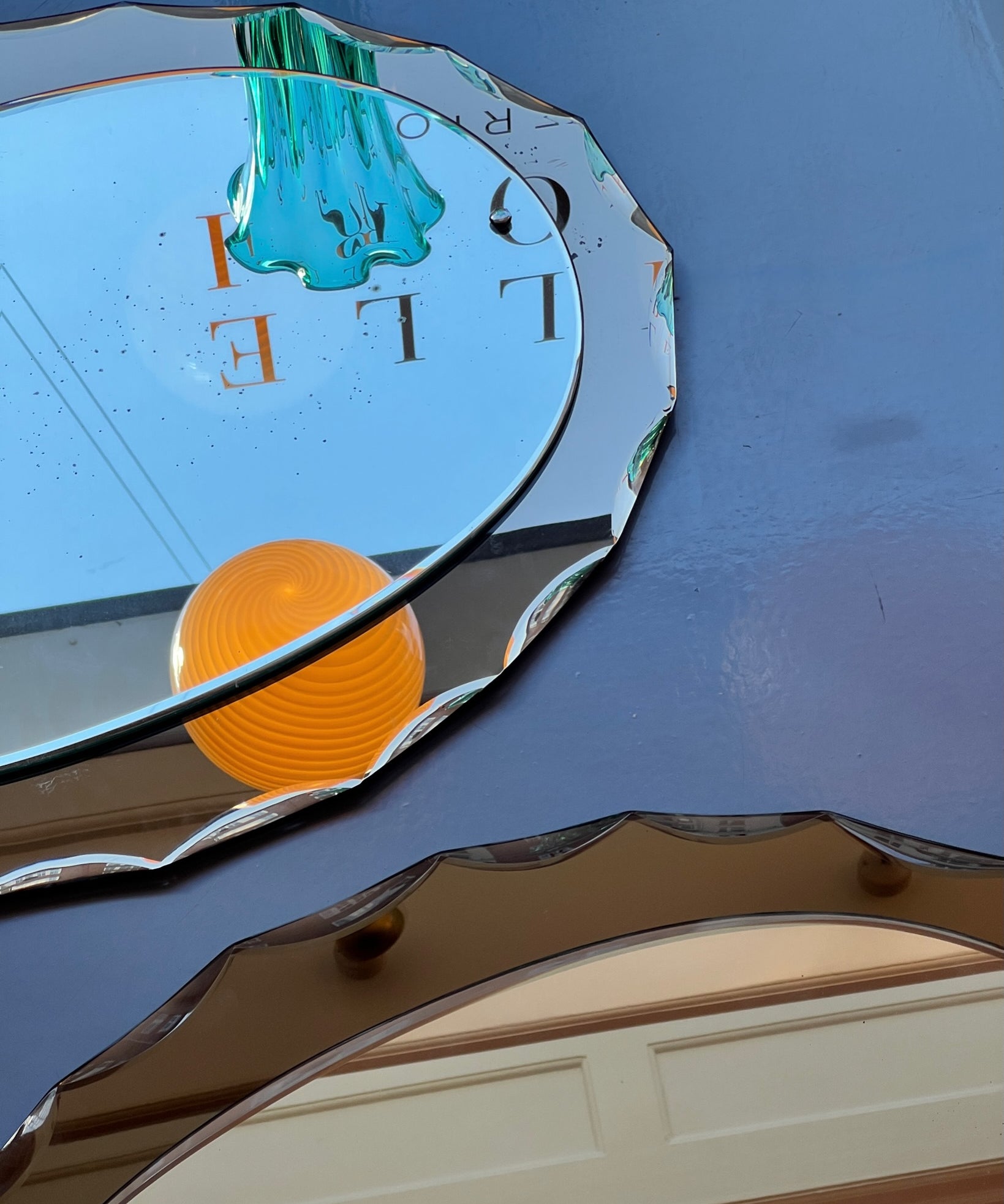 Vintage Italian mirror with brown facetted frame