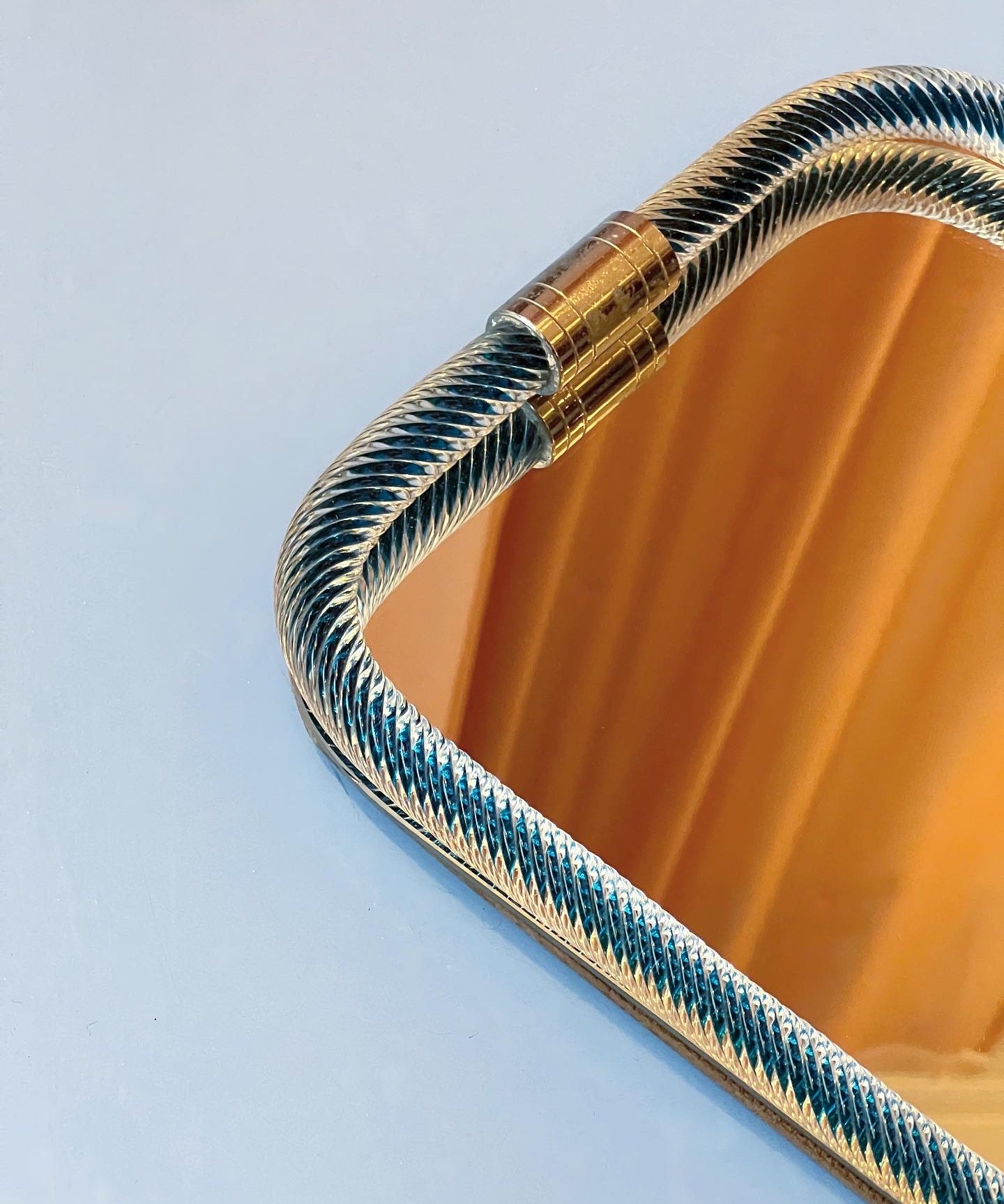 Vintage Italian mirror with twisted blue glass frame