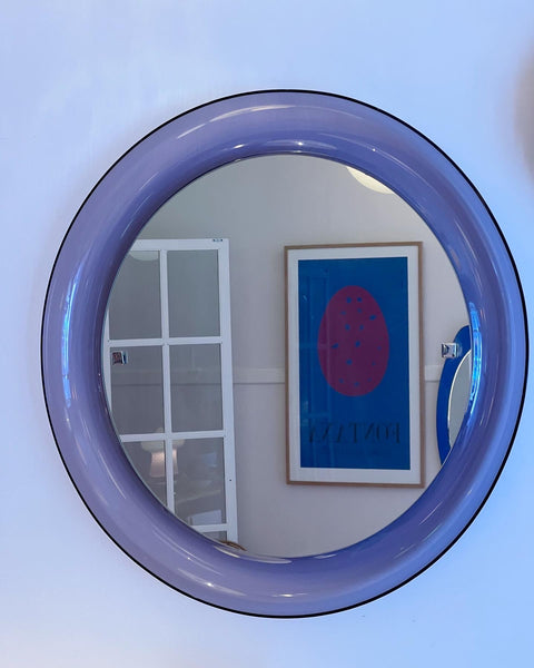 Round vintage Italian mirror with purple plastic frame