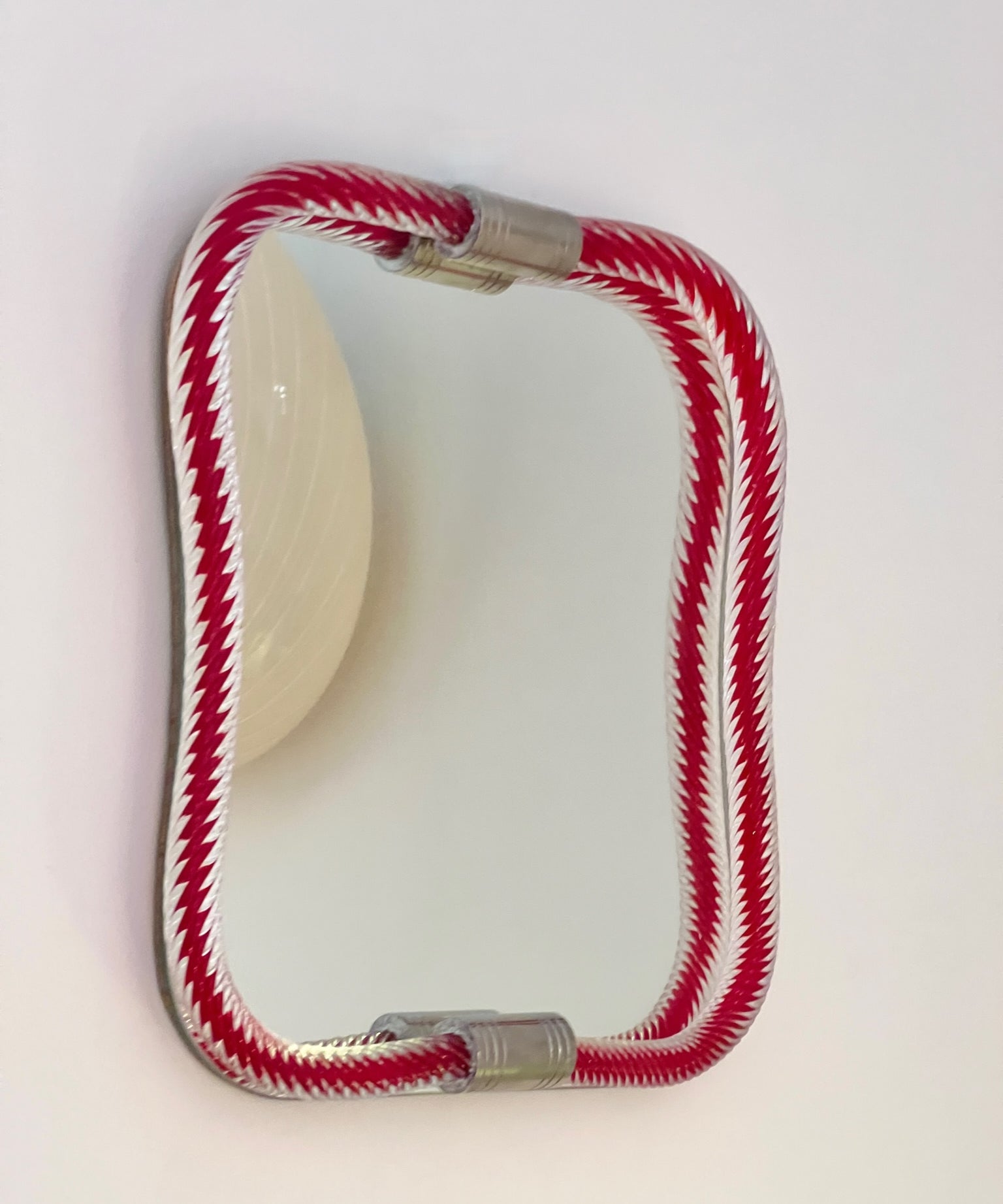 Vintage Italian mirror with red twisted clear glass frame