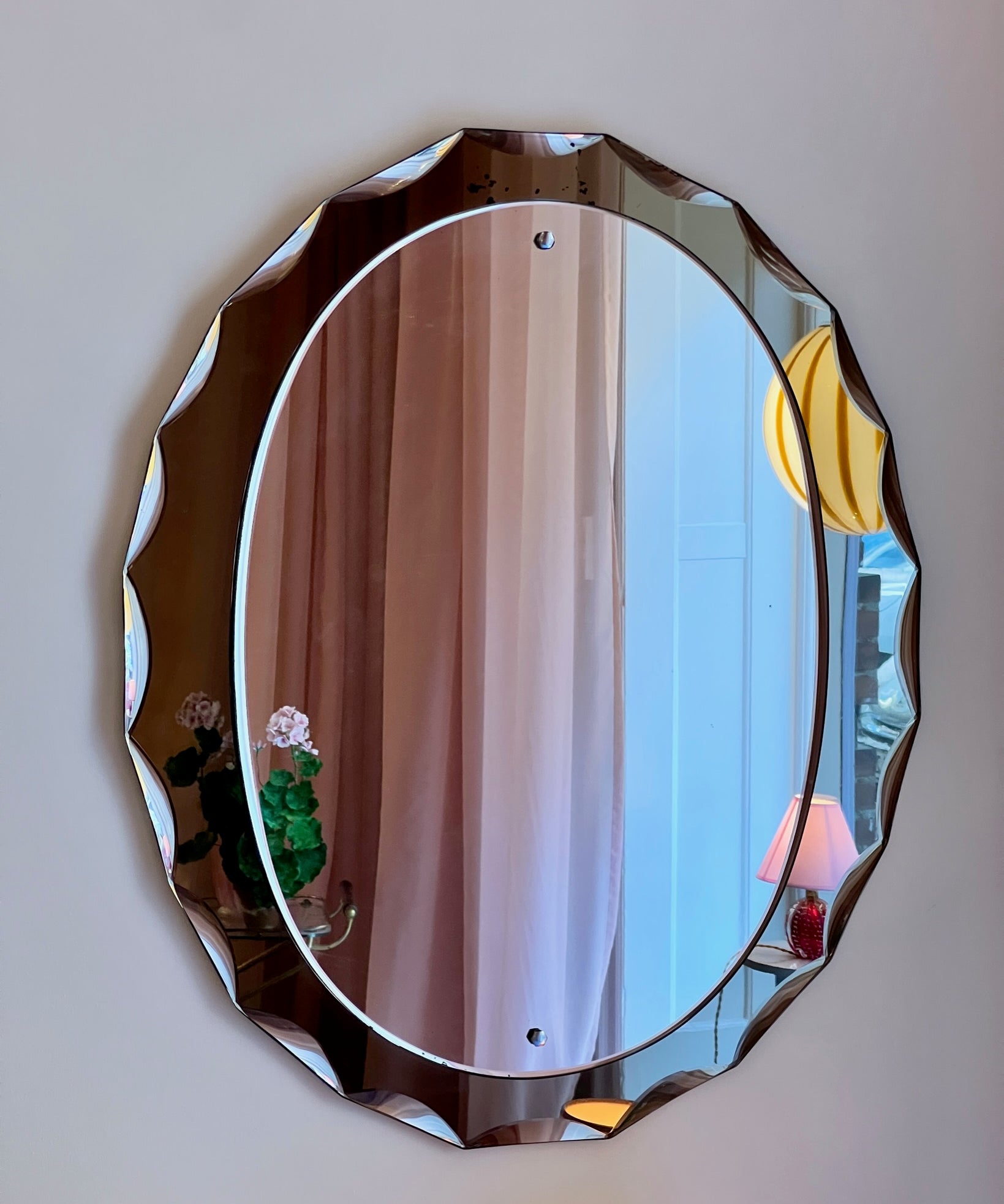 Vintage Italian mirror with brown facetted frame