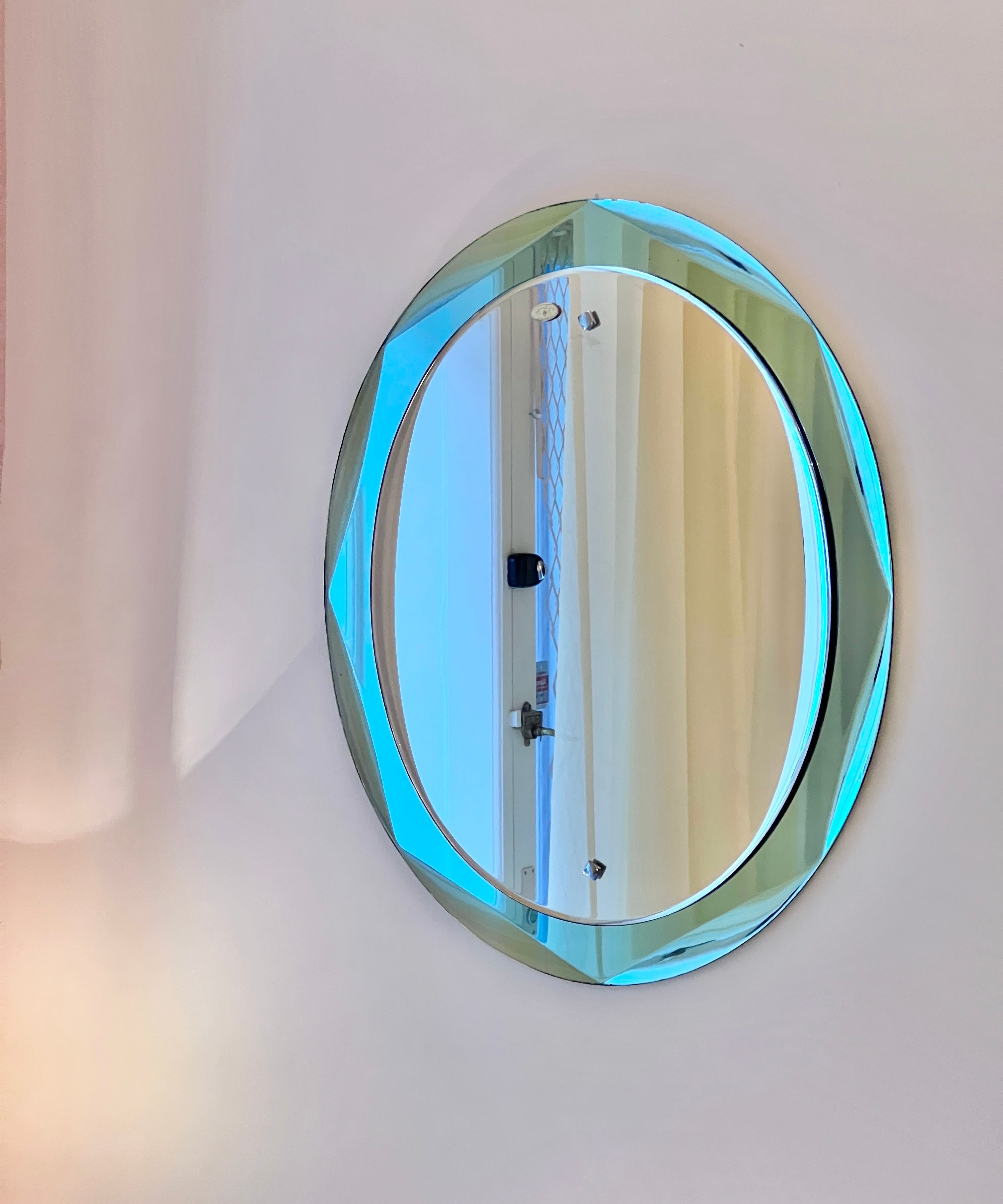 Vintage Italian mirror with facetted turquoise mirror frame