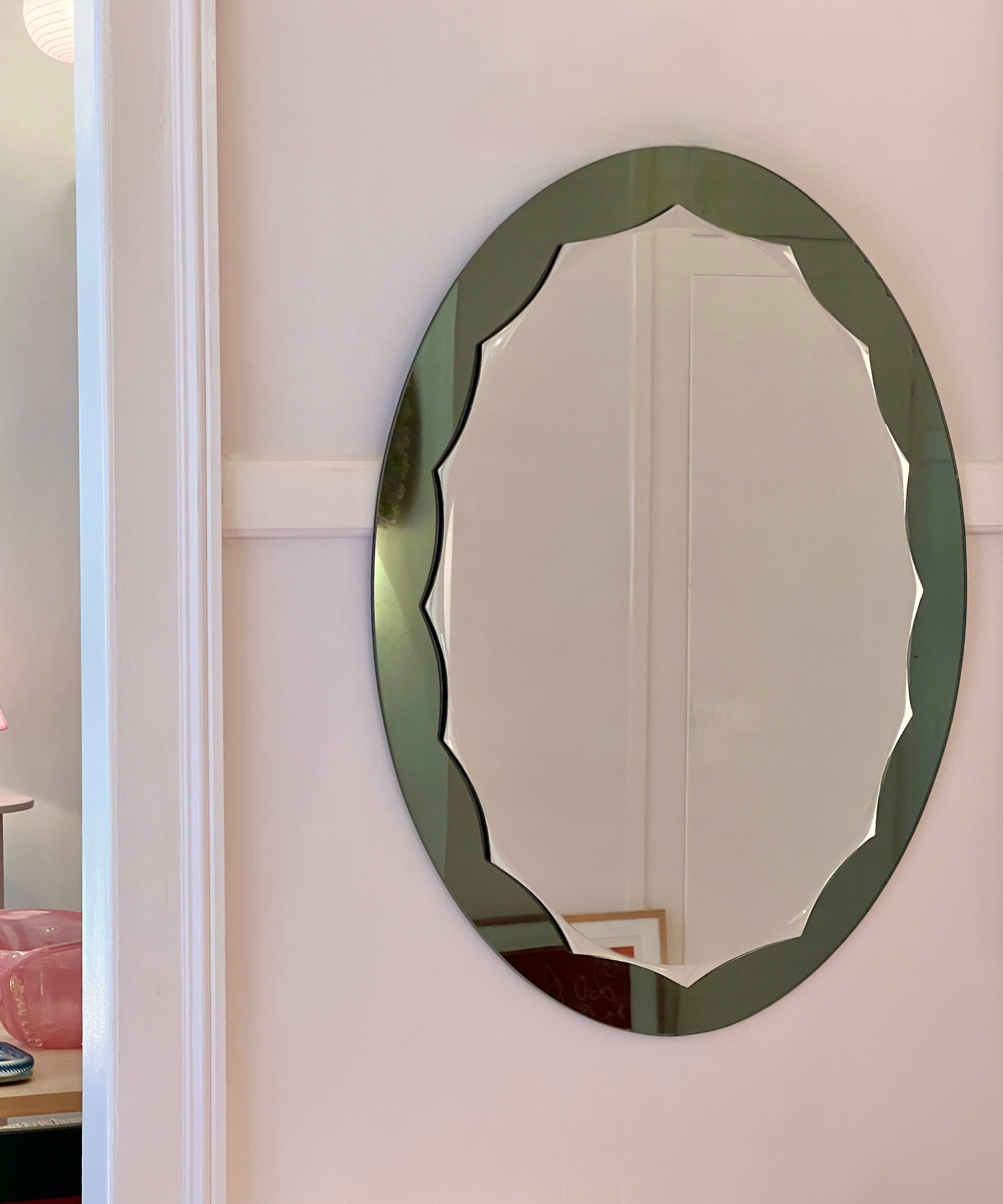 Vintage Italian mirror with oval green scalloped frame