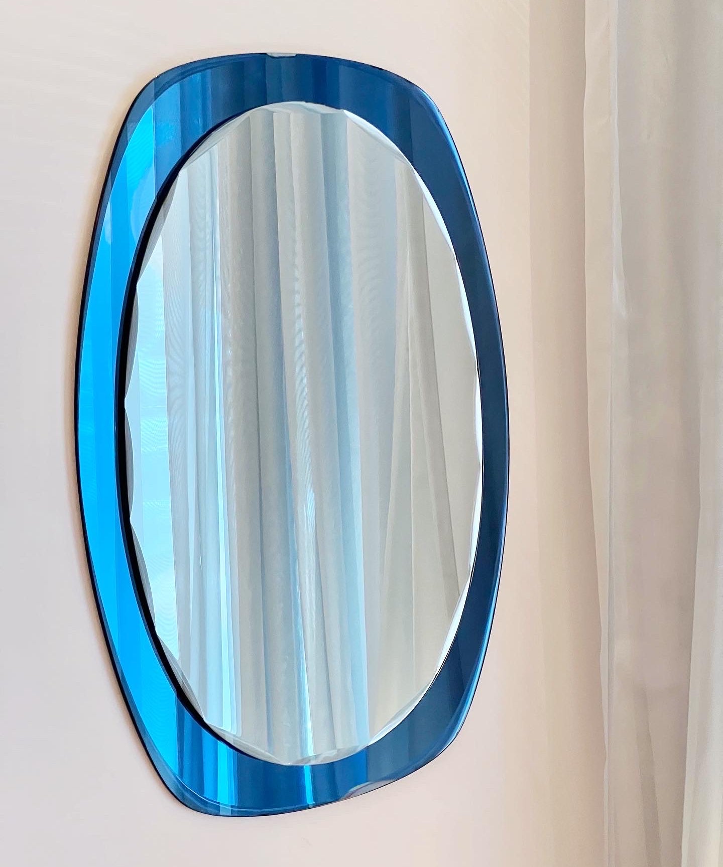 Vintage Italian mirror with blue faceted mirror frame