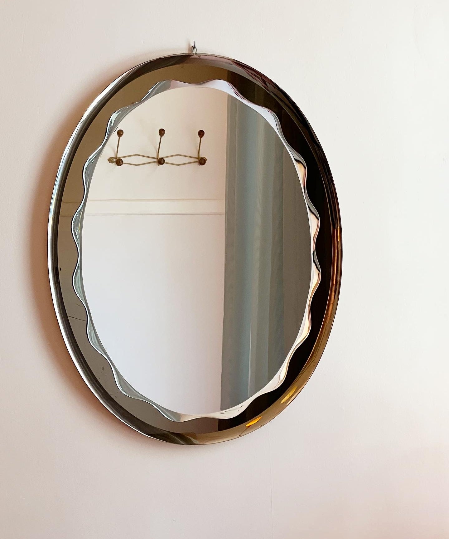 Vintage Italian mirror with smoked brown scalloped frame