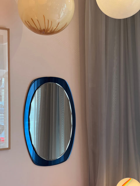 Vintage Italian mirror with blue faceted mirror frame