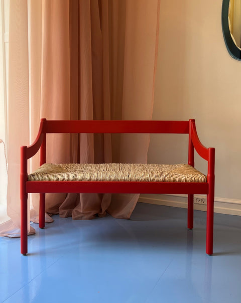 Carimate red bench by Vico Magistretti