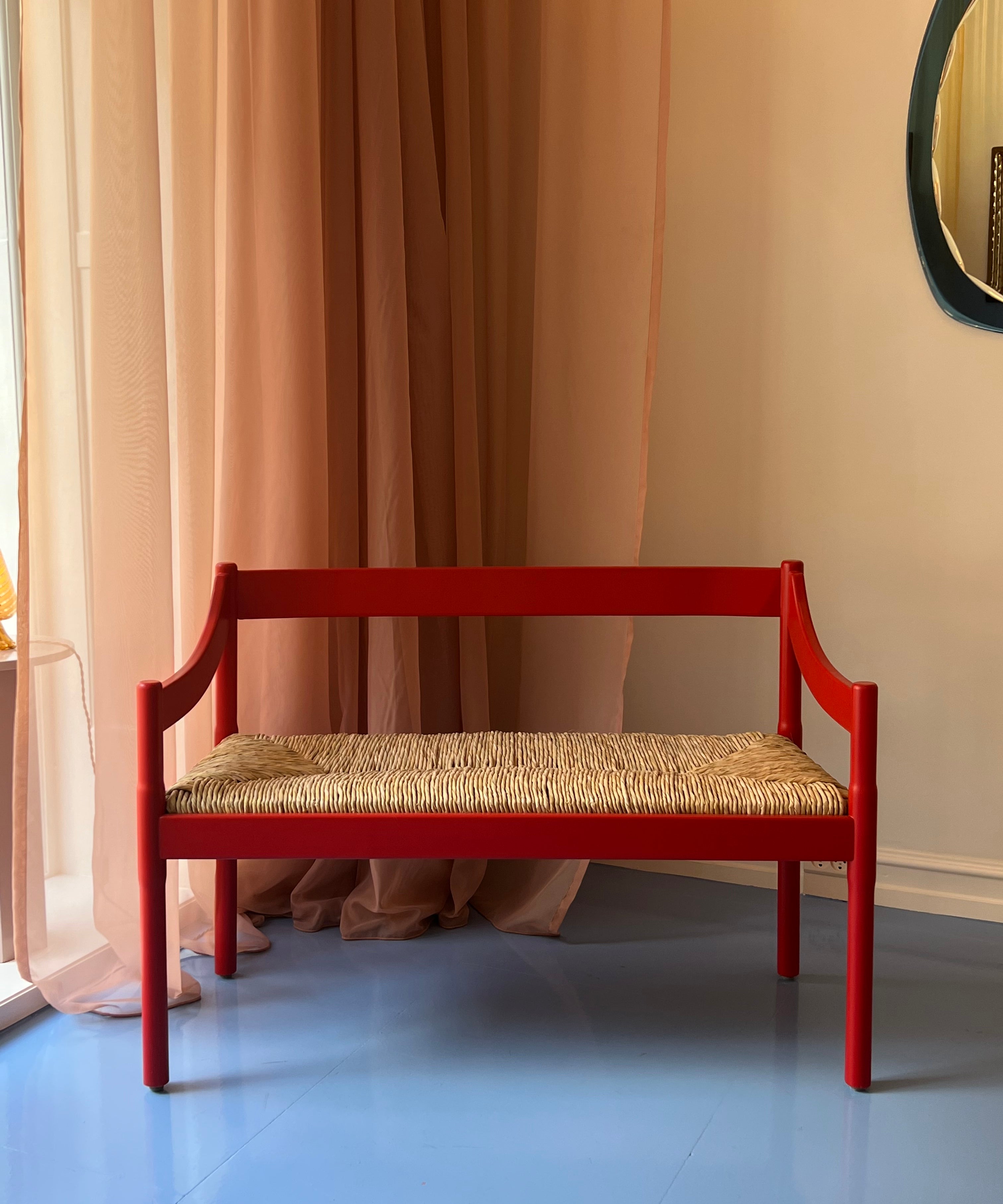 Carimate red bench by Vico Magistretti